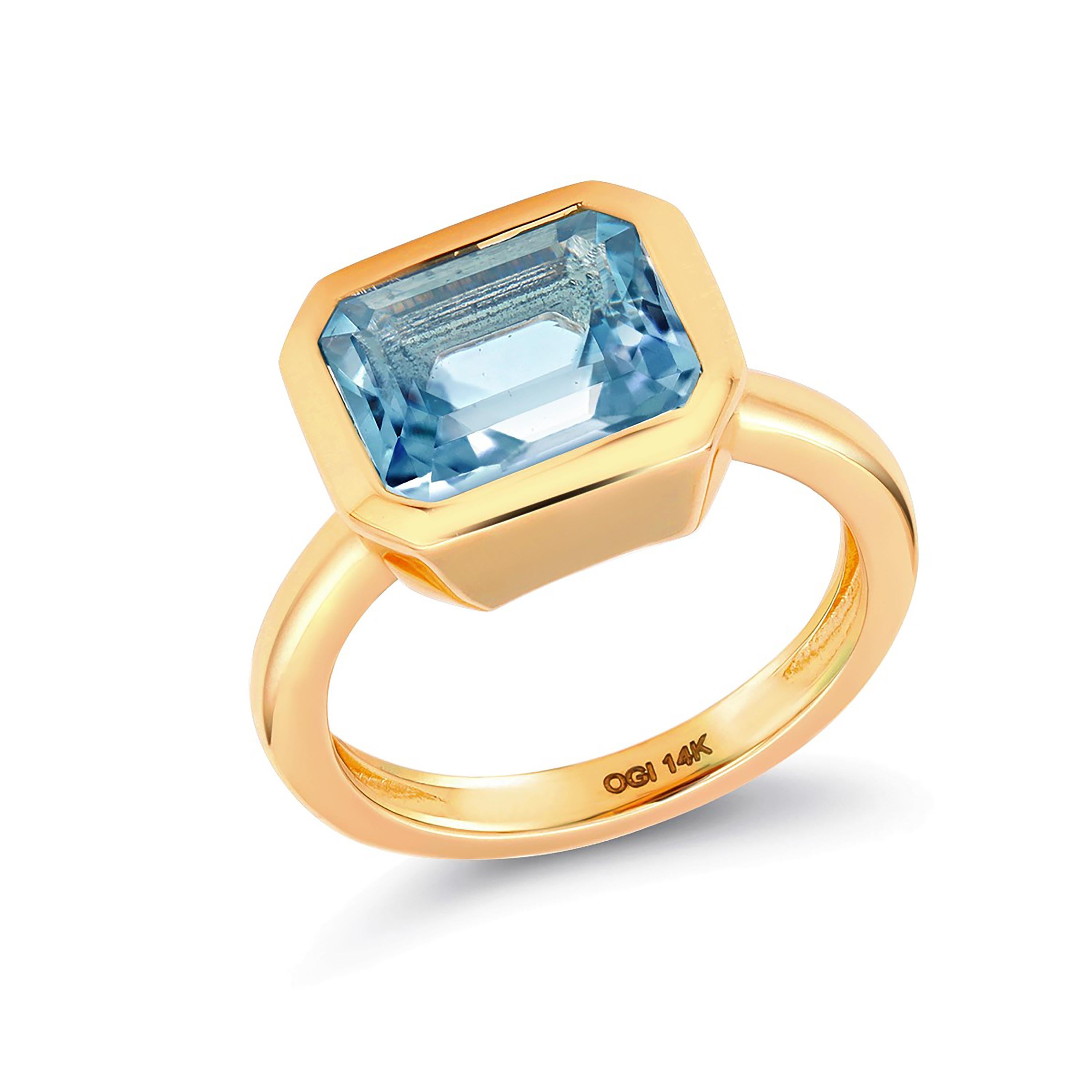 Modern Emerald Shape Aquamarine Bezel Raised Dome Yellow Gold Cocktail Ring