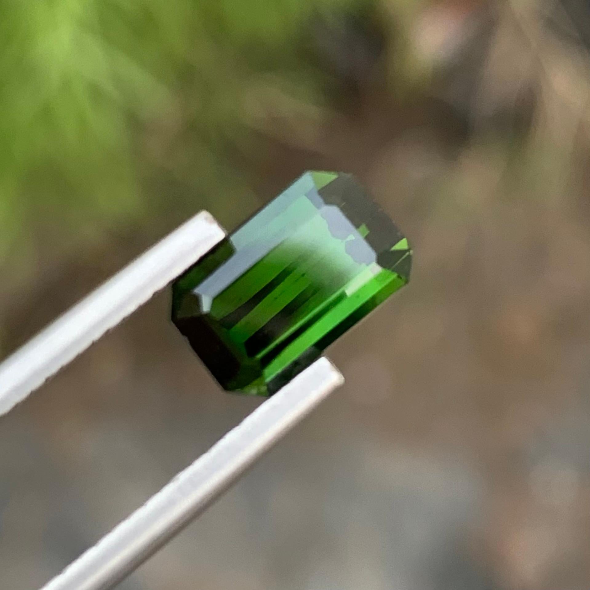 Loose Green Tourmaline 
Weight: 2.60 Carat 
Dimension: 9 x 5.8 x 5.3 Mm
Colour: Dark Green 
Origin: Afghanistan 
Certificate: On Demand 
Treatment: Non
Shape: Emerald 

Tourmaline, a gemstone known for its striking array of colors, is a boron