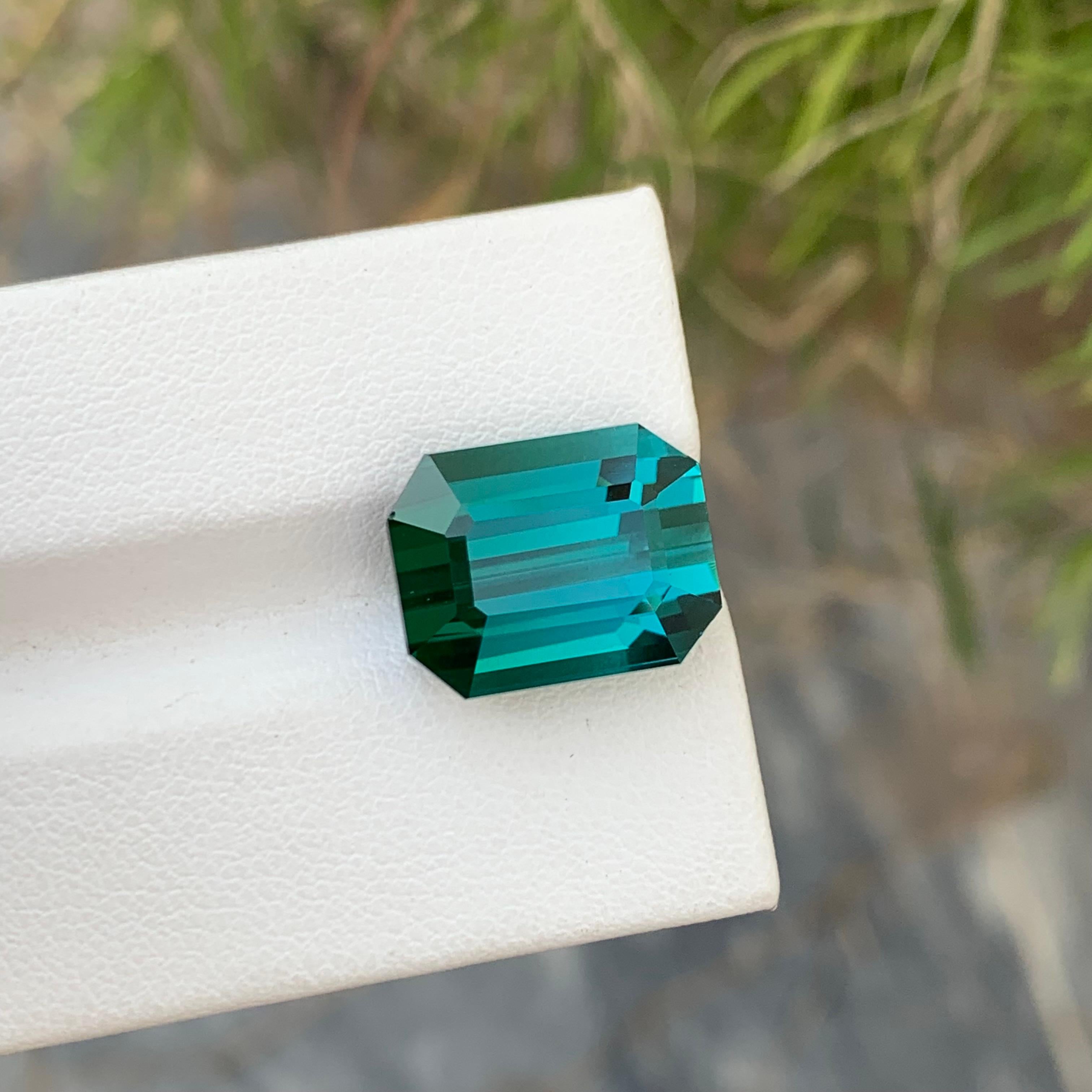 Loose Lagoon Tourmaline 
Weight: 13.10 Carats 
Dimension: 14.4 x 11.1 x 8.9 Mm 
Origin: Afghanistan 
Colour: Greenish Blue 
Shape: Emerald 
Treatment: Non 
Certificate: On Demand 
Lagoon Tourmaline, a captivating member of the tourmaline family, is