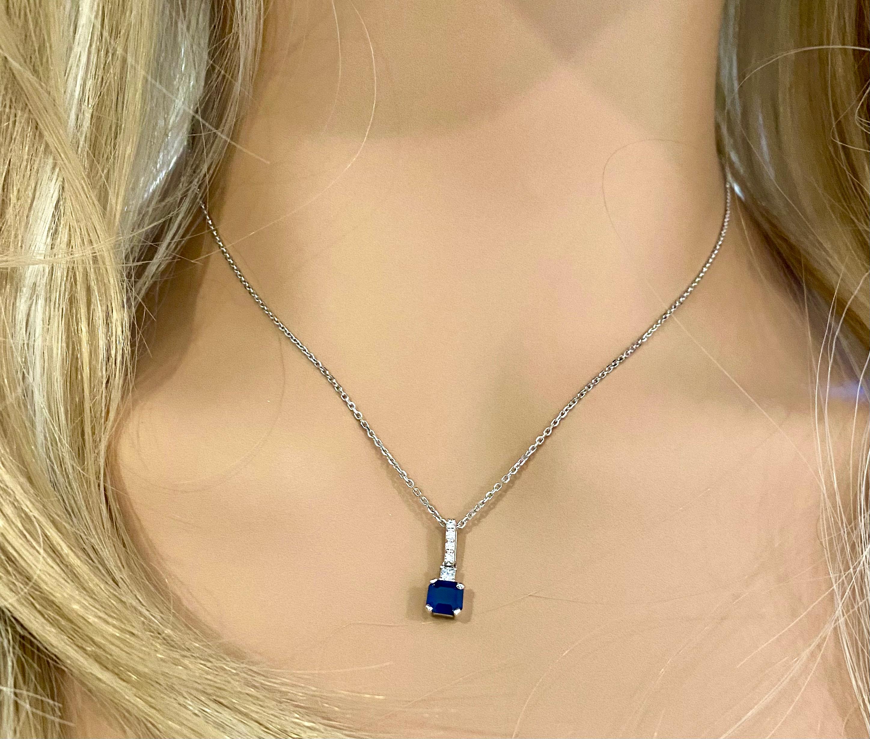 Introducing our exquisite Emerald Shaped Blue Sapphire with Princess Diamond Bail Gold Pendant Necklace, a captivating piece of jewelry that effortlessly combines elegance and sophistication. Crafted with utmost precision and attention to detail,