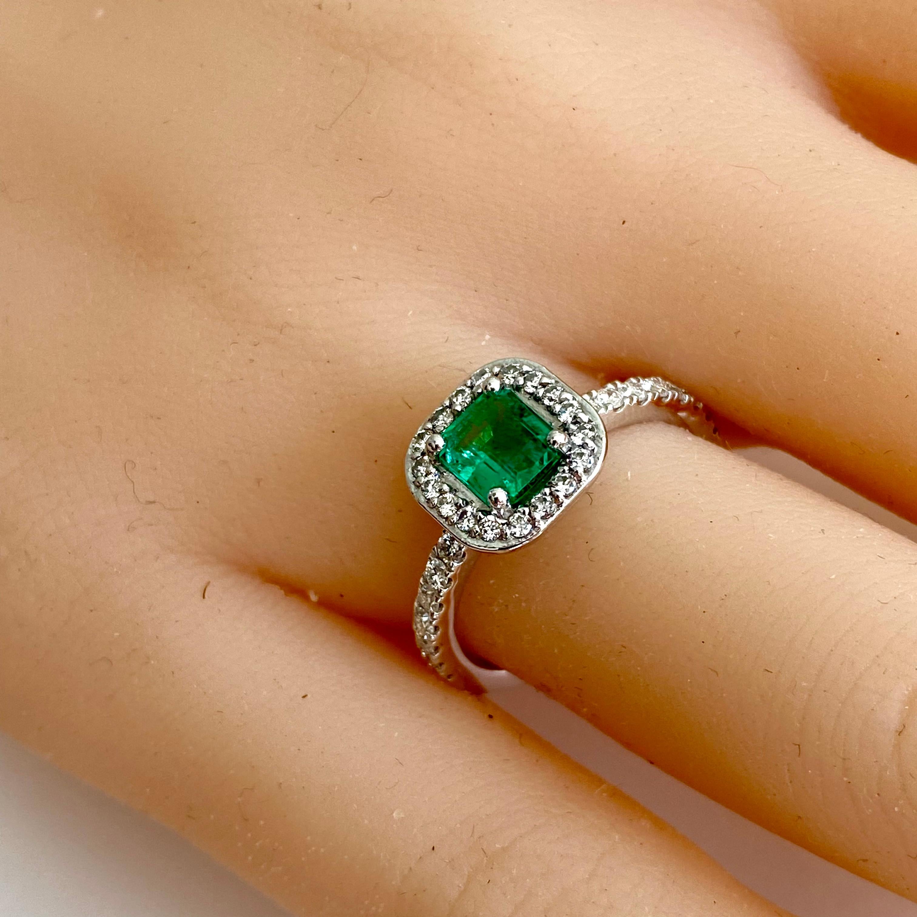 Women's Emerald Shaped Emerald Diamond 1.85 Carat Platinum Halo 0.41 Inch Wide Ring For Sale