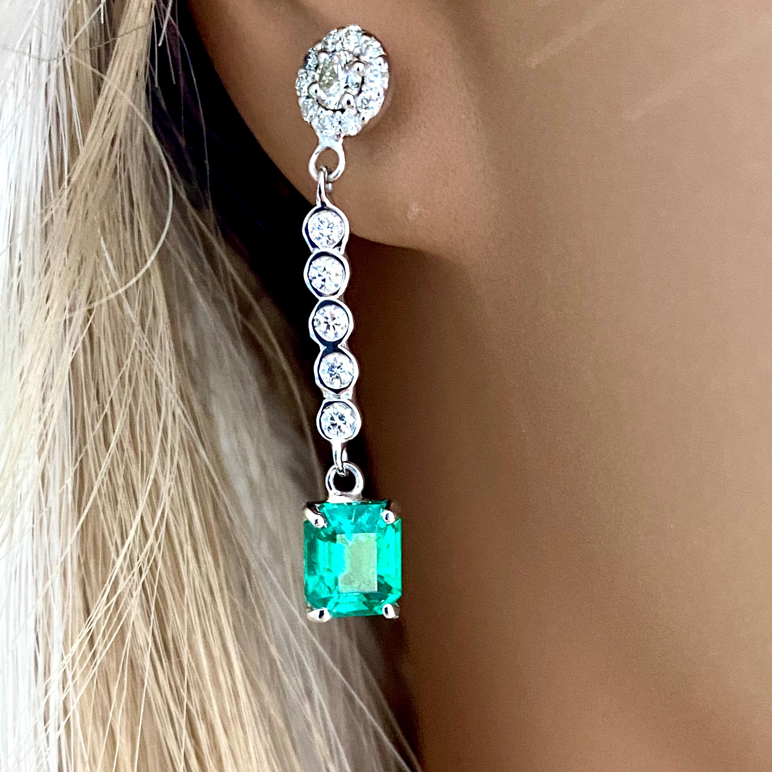 Contemporary Emerald Shaped Emerald and Halo Diamond Cluster White Gold Drop Earrings 