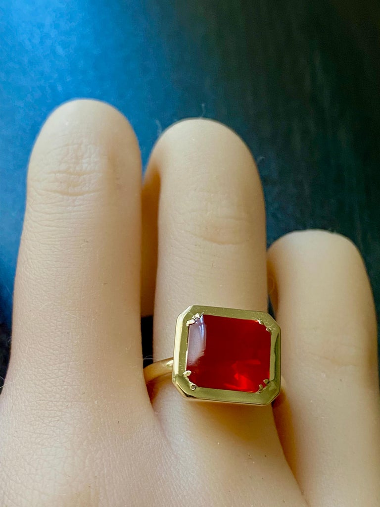 Modern Emerald Shaped Fire Opal Bezel Raised Dome Yellow Gold Cocktail Ring For Sale