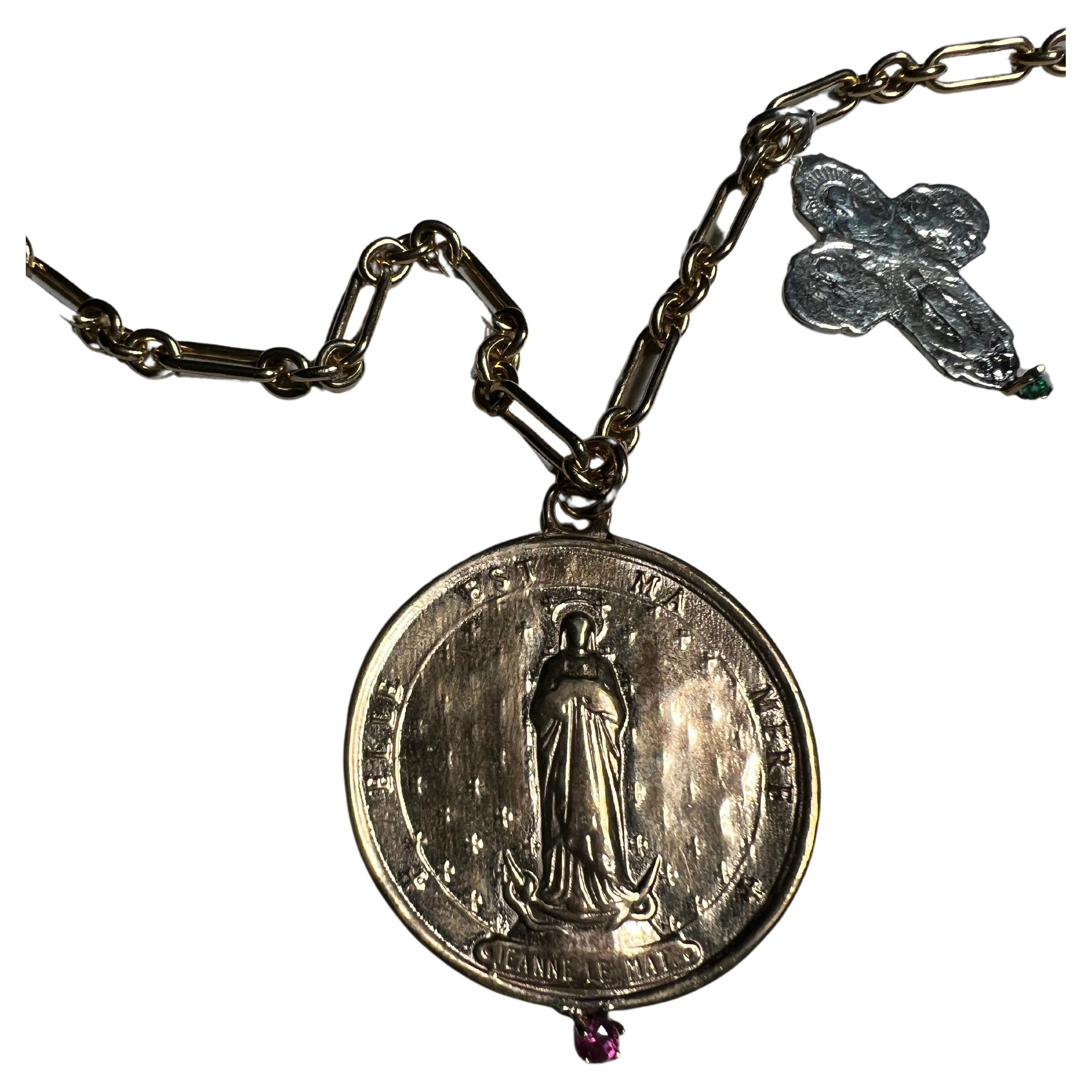 Emerald Prong set Silver Cross and Medal Coin with Jeanne Le Mat holding a Ruby on a Long Gold Filled Chain Necklace by Designer J Dauphin

Exclusive piece with a Round Bronze Medal Coin with French Saint Jeanne Le Mat holding a Ruby and a Silver