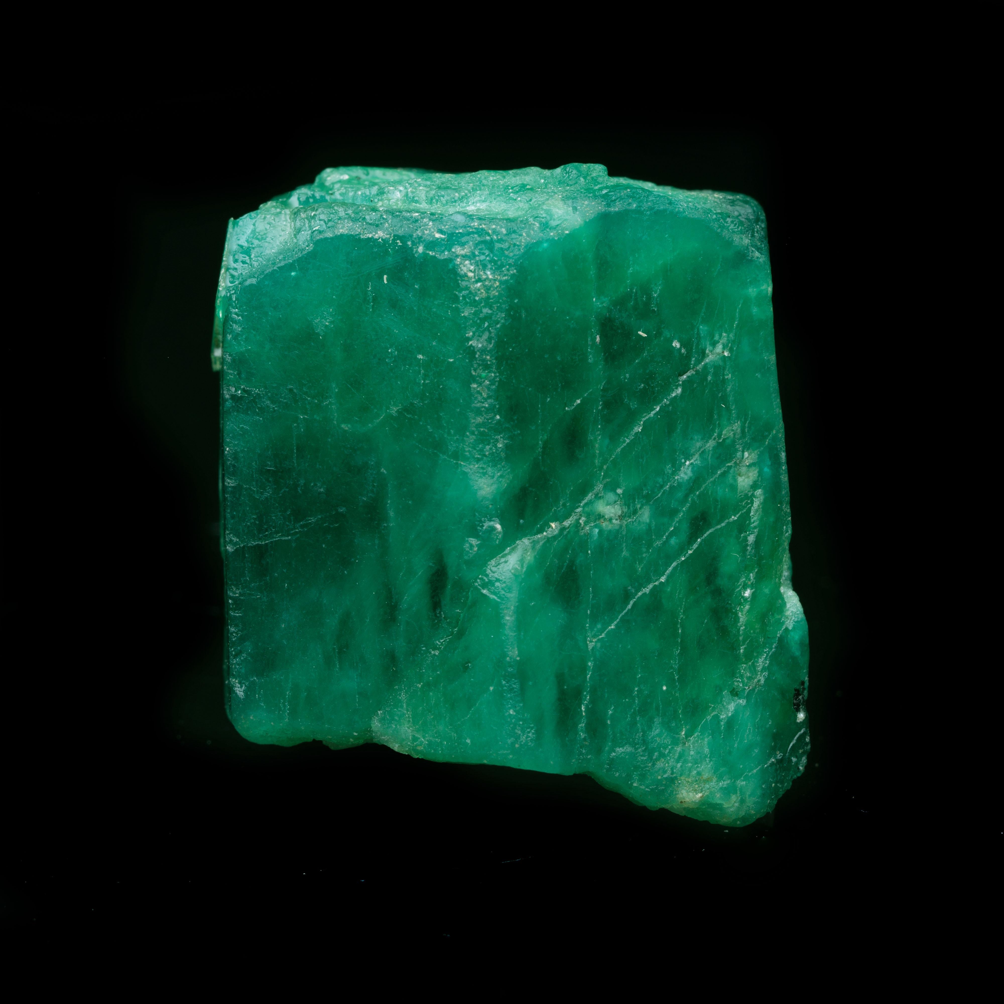 This gorgeous color 56.72-gram emerald single crystal from Colombia – the world's most famous source for emeralds where this green form of beryl is sourced specifically for brilliance and purity of color – displays an incredible gemmyness,