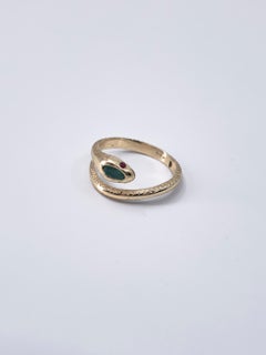 Anello serpente con smeraldo e occhi di rubino J DAUPHIN