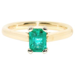 Emerald Solitaire in 14 Karat Yellow Gold