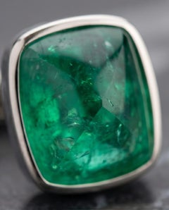 Emerald Sovereign -A pair of cufflinks that embody quiet power.