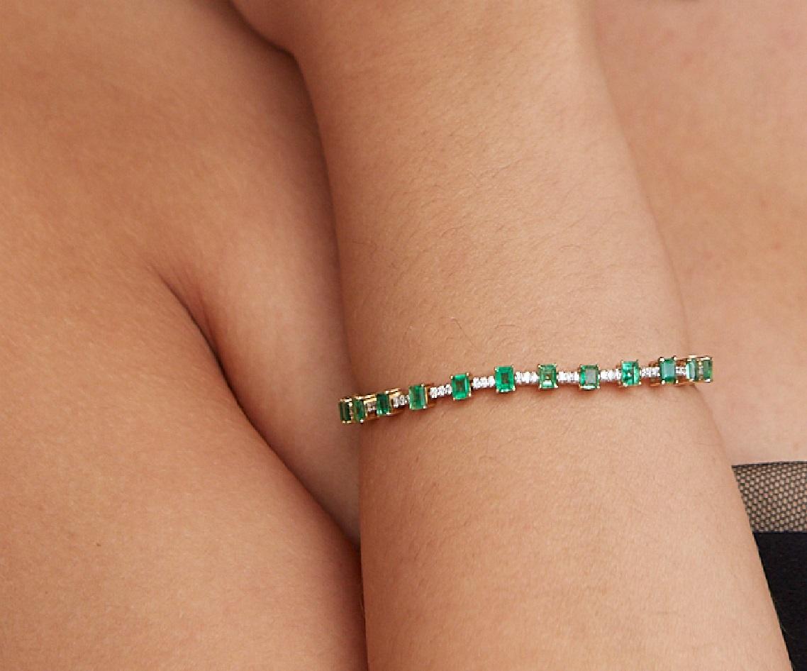 Tresor Diamond Bracelet features 0.60 cts diamond and 3.45 cts emerald in 18k yellow gold. The Bracelet are an ode to the luxurious yet classic beauty with sparkly diamonds. Their contemporary and modern design makes them versatile in their use. The