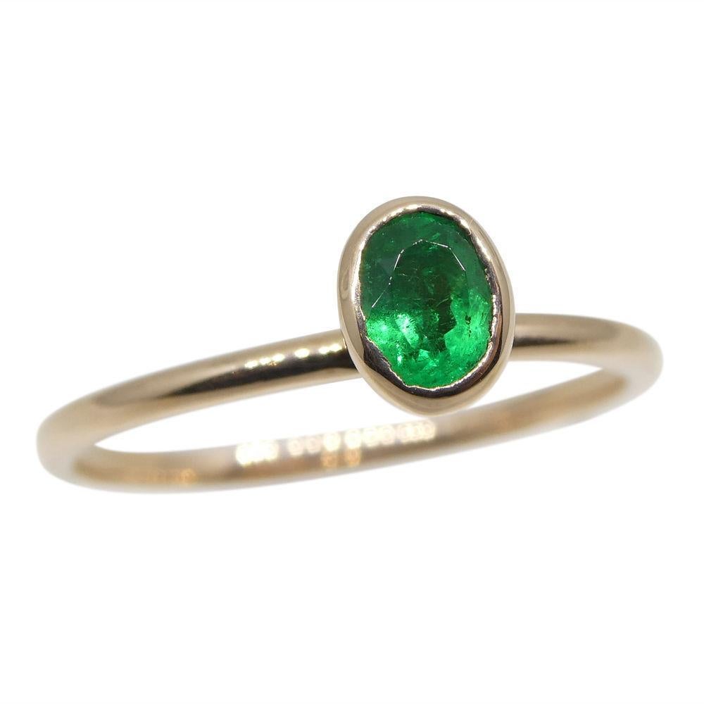 Oval Cut Colombian Emerald Stacker Ring set in 10kt Pink/Rose Gold For Sale