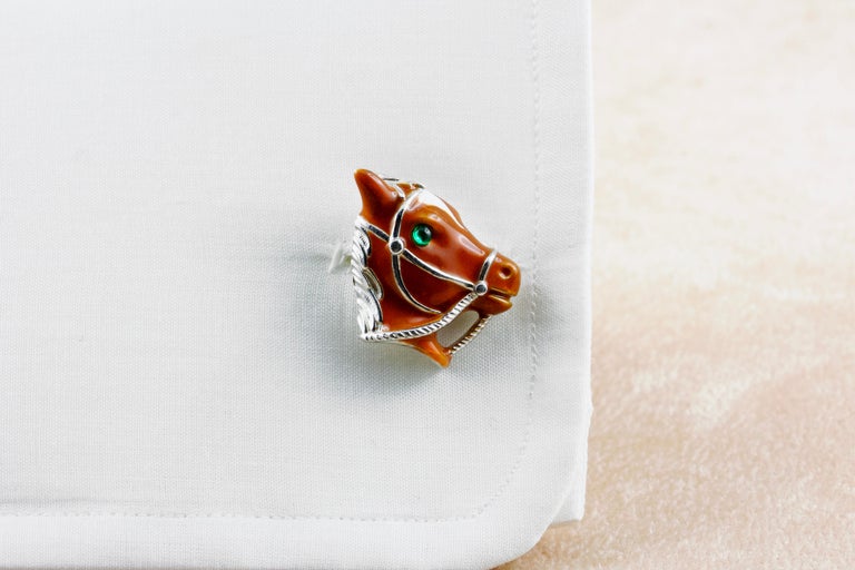 Cufflinks made in sterling silver 925 featuring a horse,  thanks to amazing hand enamel life-like features is vividly rendered.
Emeralds on the eyes.
 It is also possible customizable the cufflinks and depict the fur of your horse just sending a few