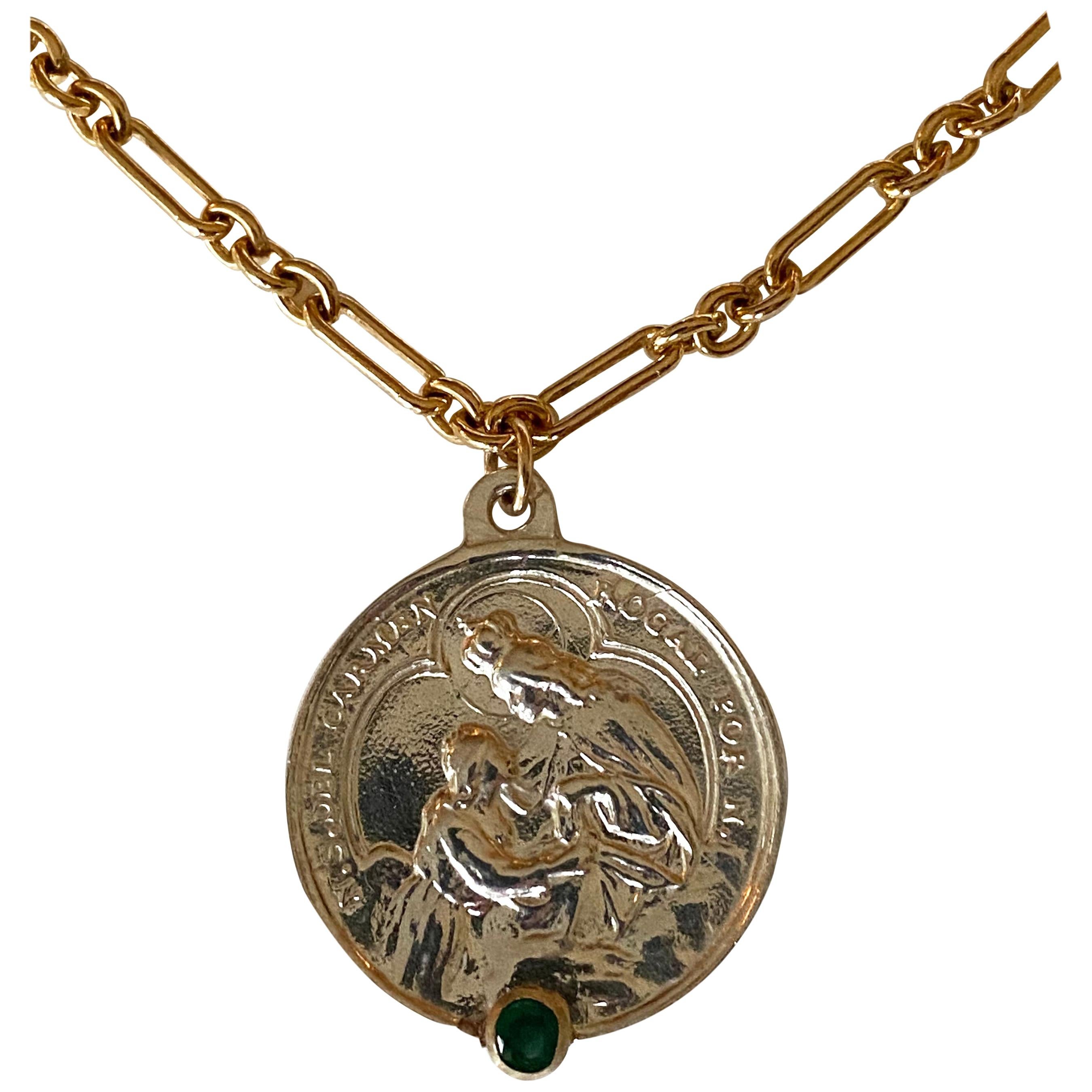 Emerald Sterling Silver Sacred Medal Necklace Chain Spiritual Religious
Gold Filled Chain

Exclusive piece with a Round Virgin Mary Medal in Silver with an Emerald set in a Gold Prong prong and with a gold filled Chain. Necklace is 16