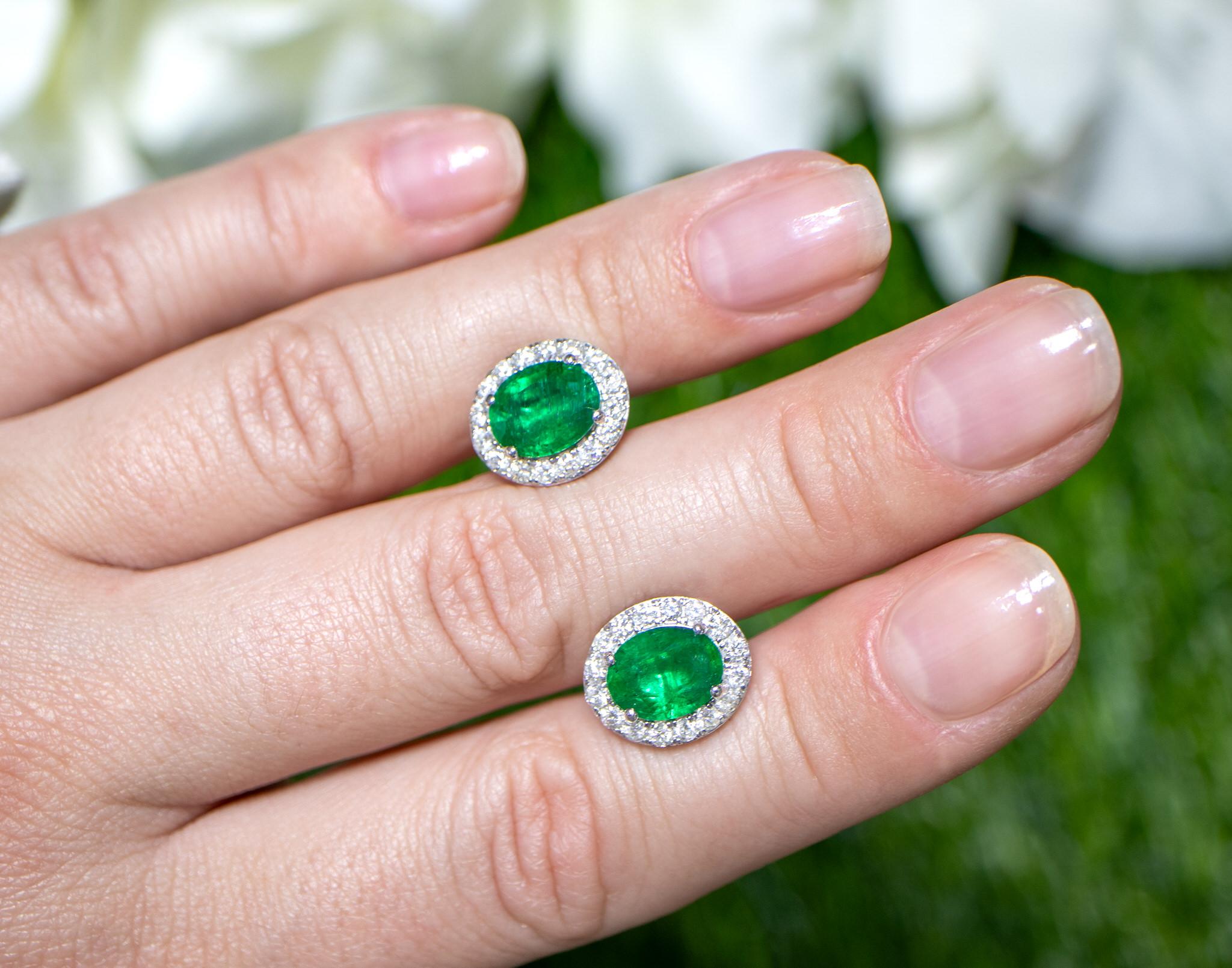 Oval Cut Emerald Stud Earrings Diamond Halo 4.65 Carats 18K Gold For Sale