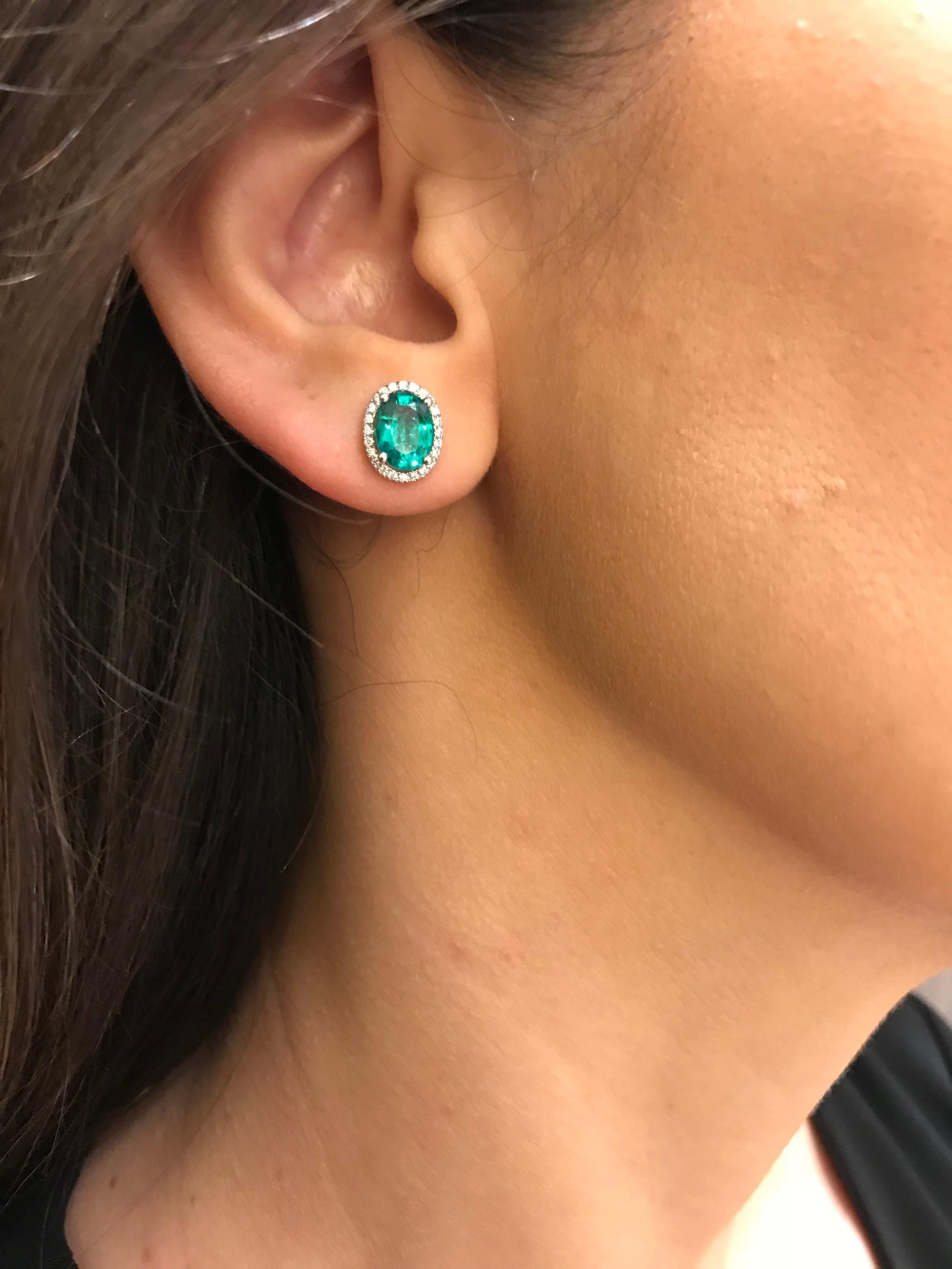 Contemporary Emerald Stud Earrings with Detachable Pear Shaped Diamond Halo For Sale