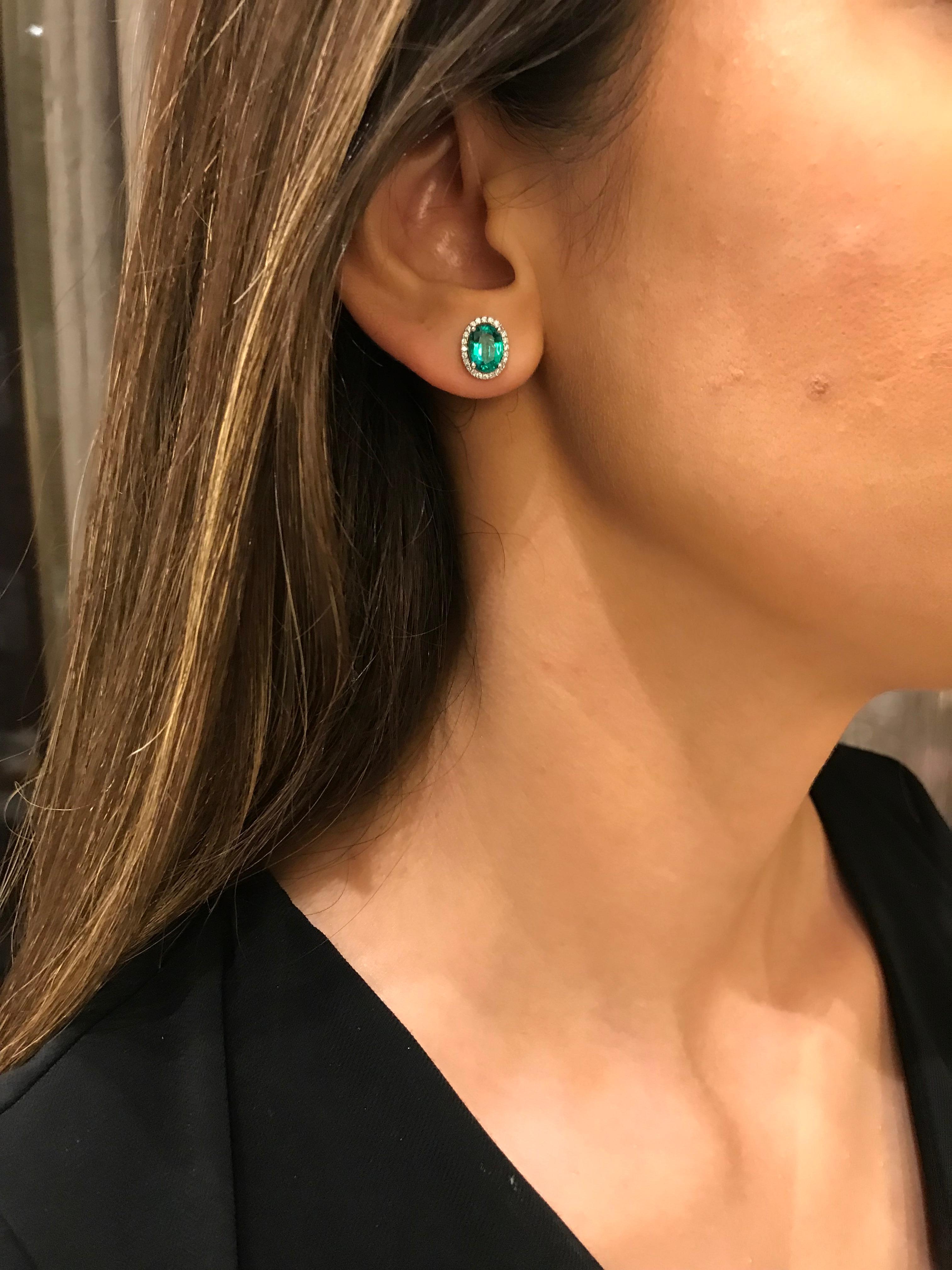 Oval Cut Emerald Stud Earrings with Detachable Pear Shaped Diamond Halo For Sale