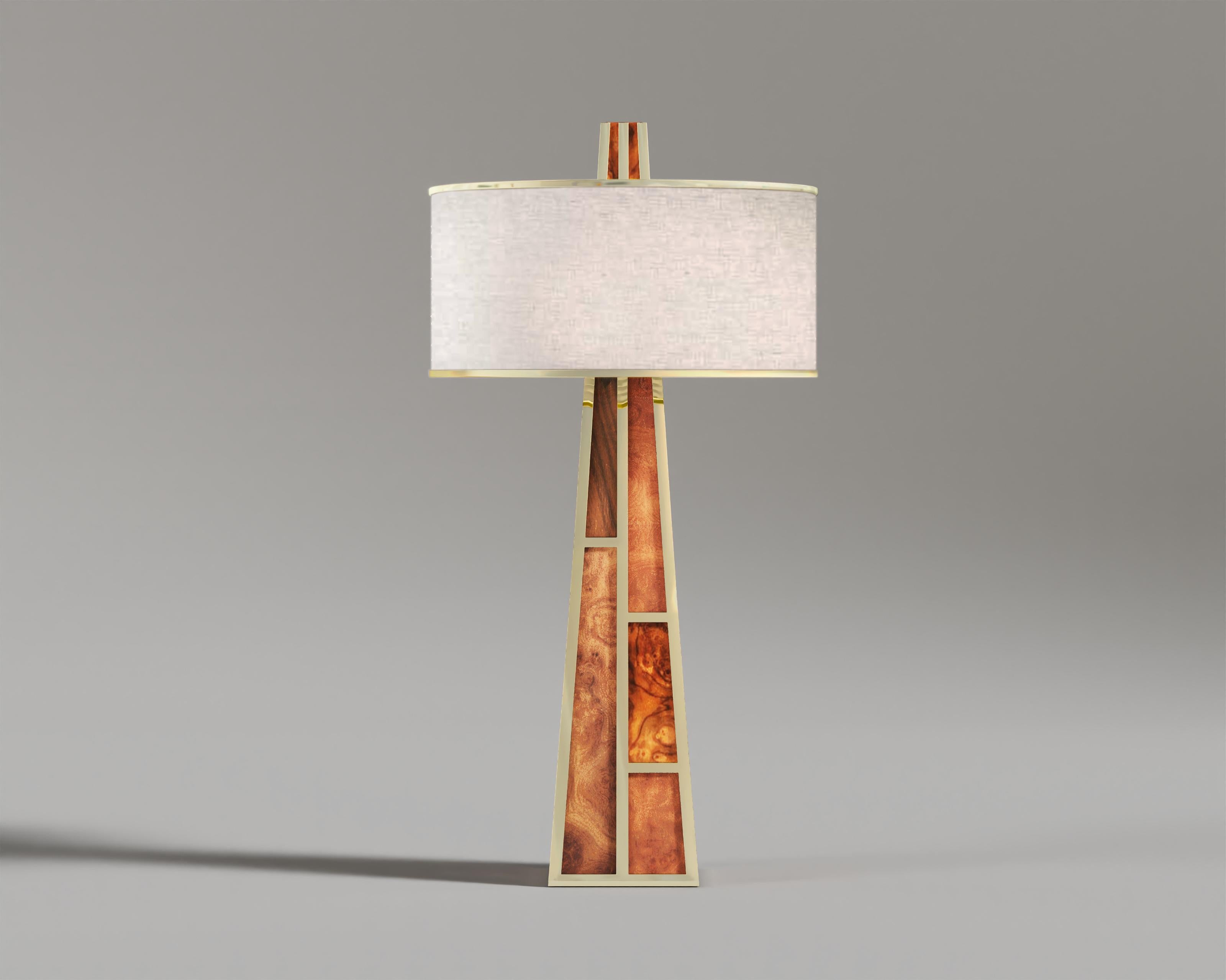 Emerald Table Lamp Wood

Like the Emerald Console Table, Emerald Table Lamp also celebrate the heritage of traditional sophistication along with the freshness of modern bravery.
Crafted from highly polished bronze and a selection of exquisite