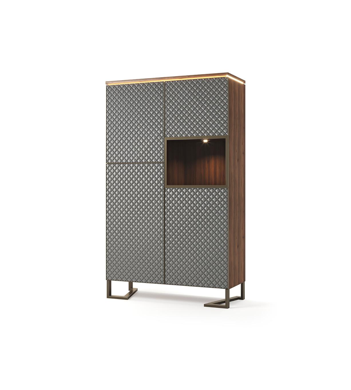 With an authentic and contemporary design, this tall display cabinet, with three doors, portrays the subtlety of woodworking, with shapes inspired by precious jewels.