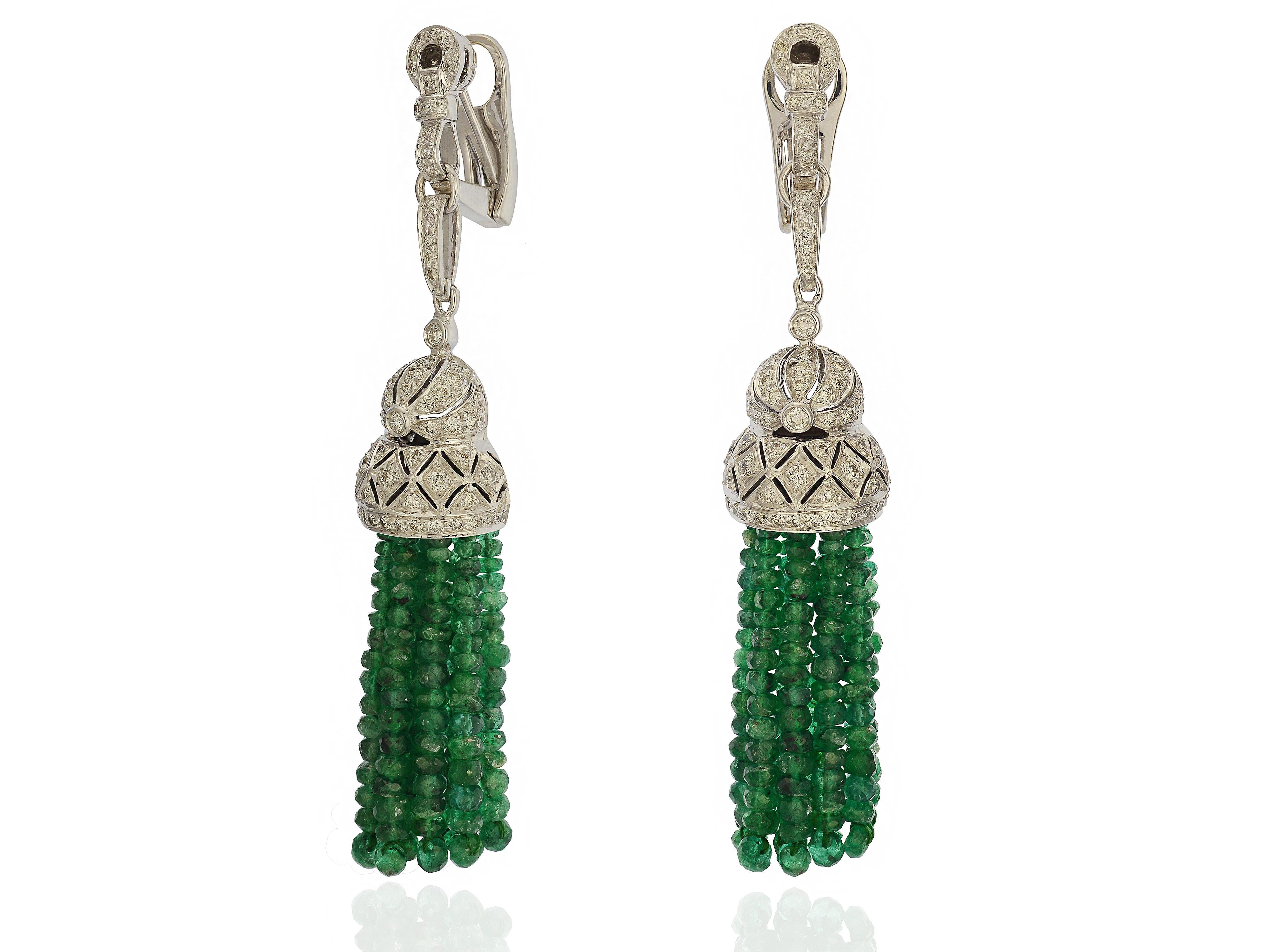 18 Karat White Gold & Emerald Tassel Drop Earrings
124 Round Brilliant Cut Diamonds Total Approximately 2.00 Carats
SI Clarity & H Color
20 Strands of Faceted Emerald Beads
Omega Clip Back with Collapsible Post