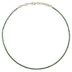 Collier tennis en émeraudes naturelles, émeraudes rondes naturelles, or jaune 14 carats