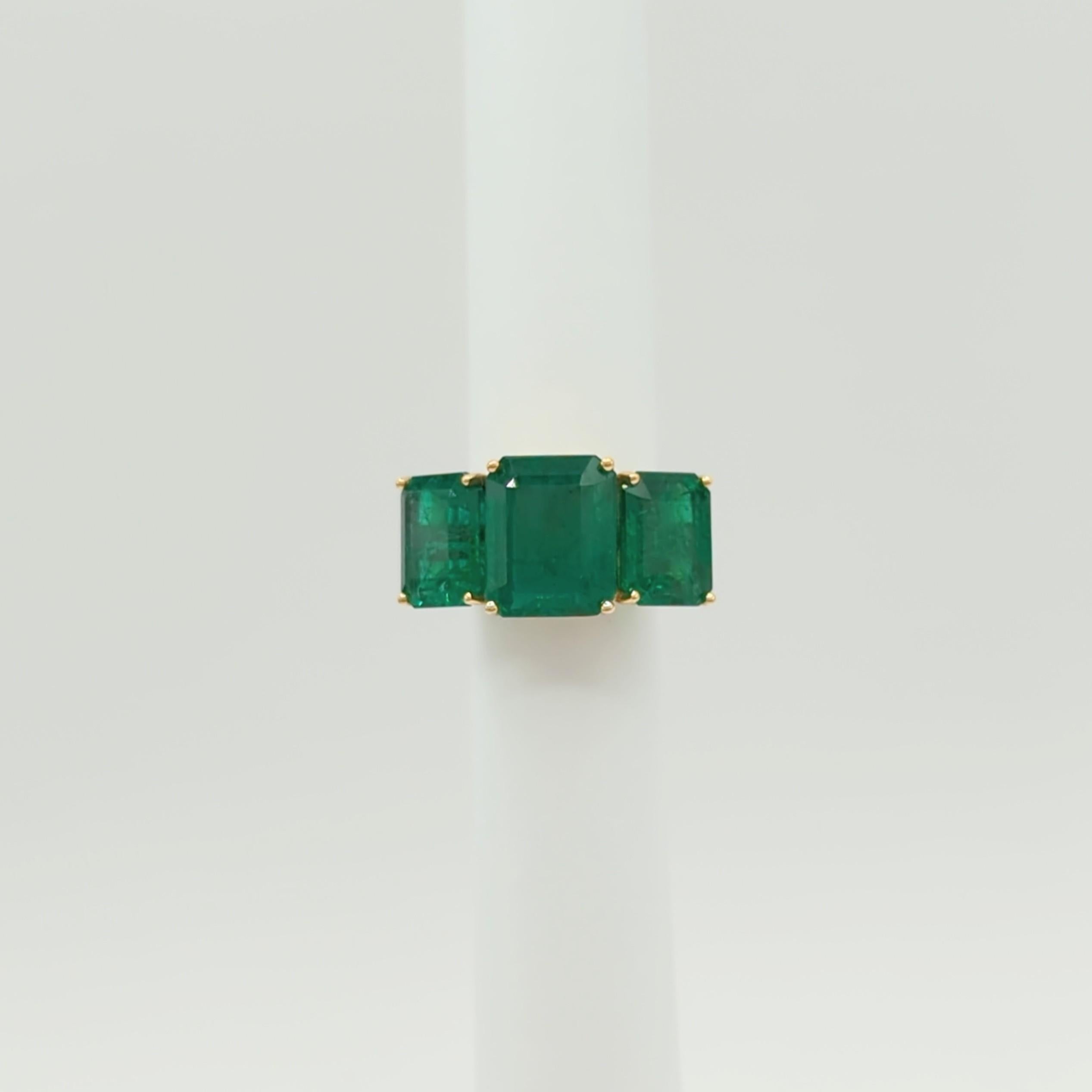 Emerald Cut Emerald Three Stone Ring in 18K Yellow Gold For Sale