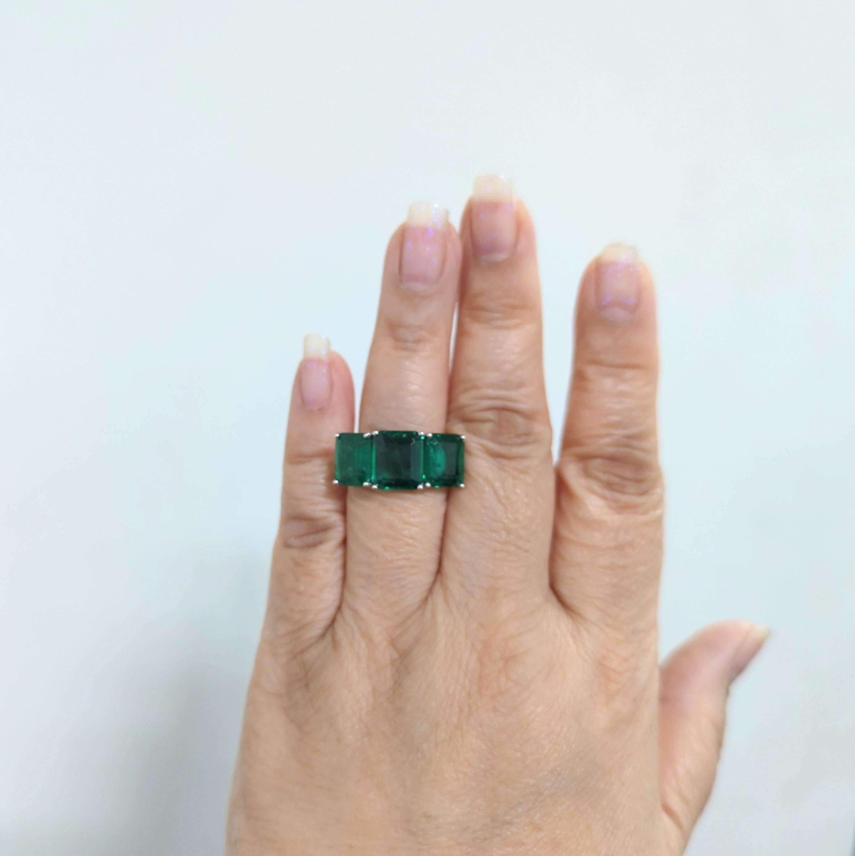 Beautiful 9.64 ct. emerald emerald cuts set in platinum.  Handmade in ring size 6.5.