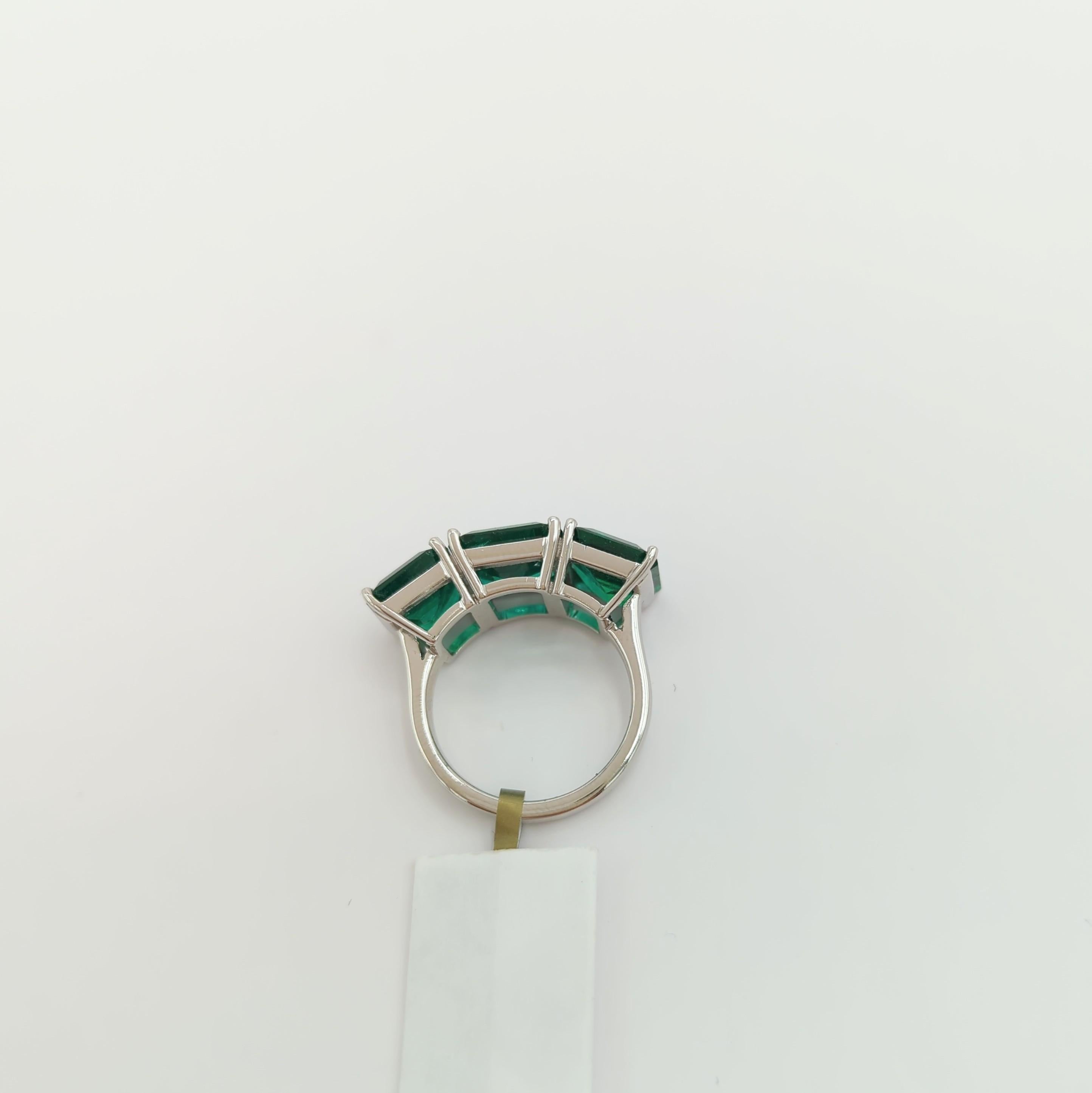 Women's or Men's Emerald Three Stone Ring in Platinum For Sale