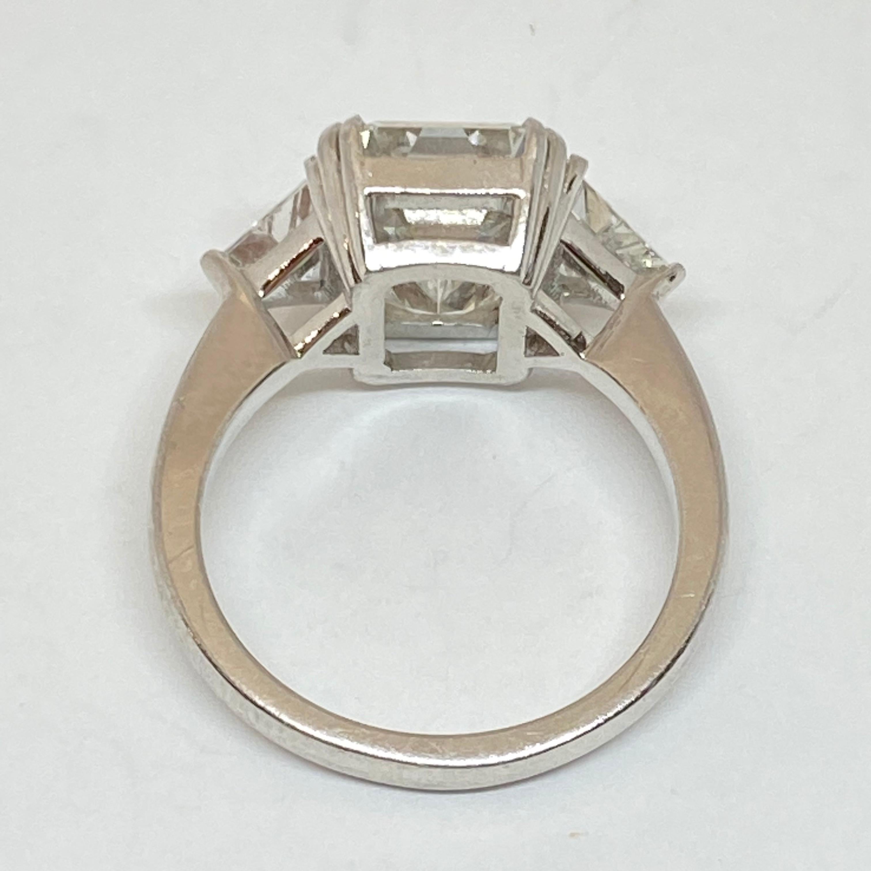 emerald cut with trillion side stones