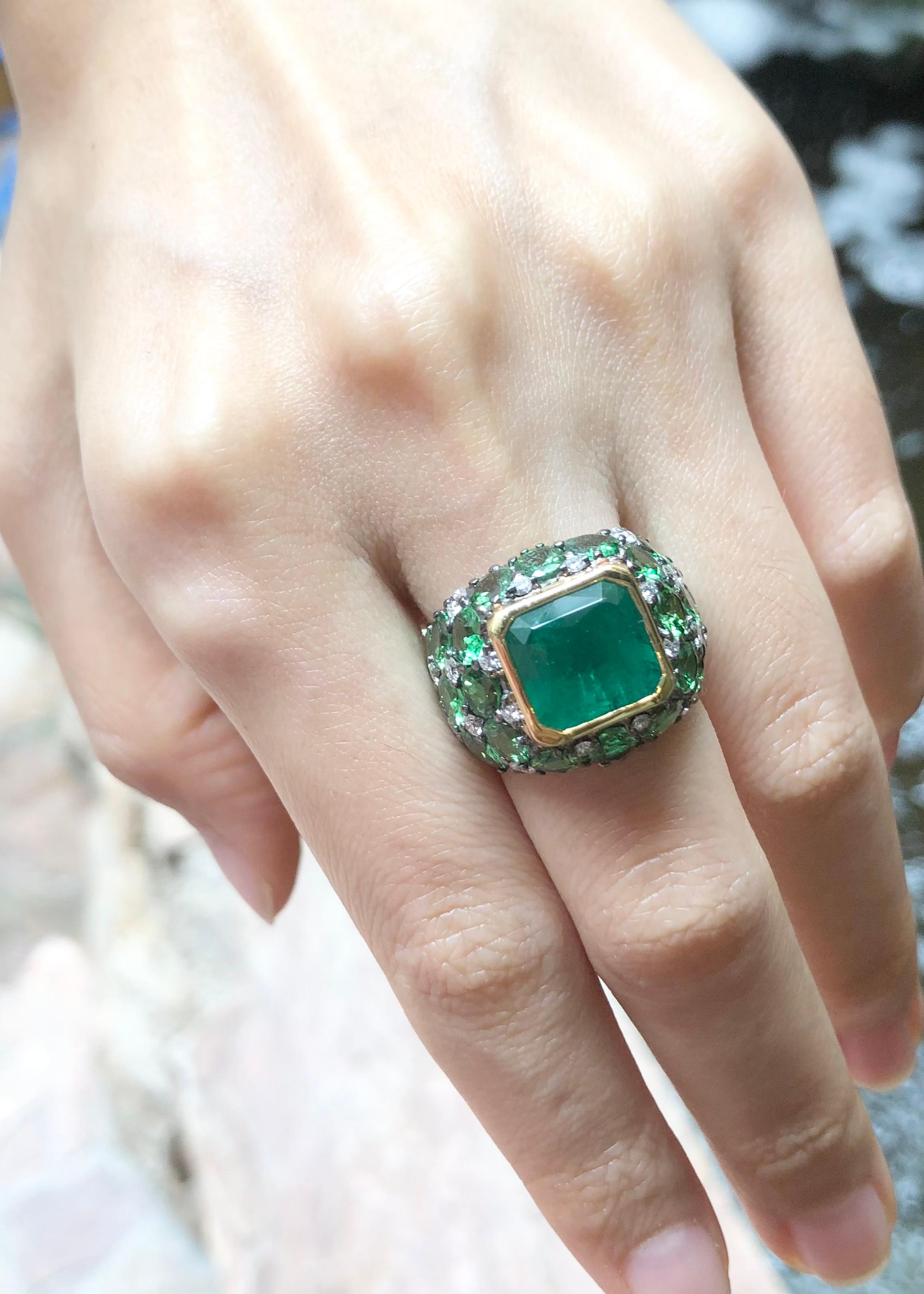 Emerald 5.22 carats, Tsavorite 7.50 carats and Diamond 0.65 carat Ring set in 18 Karat Gold Settings

Width:  2.1 cm 
Length: 1.5 cm
Ring Size: 52
Total Weight: 12.68 grams



