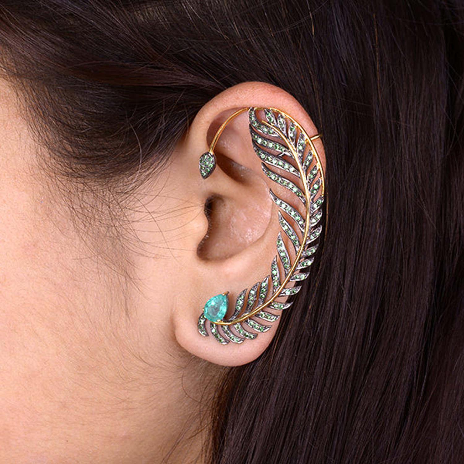 These beautiful ear climbers are handmade in 18-karat gold & sterling silver. It is set in .79 carats emerald and 1.01 carats tsavortie. Show off their unique style by sweeping your hair back.

FOLLOW  MEGHNA JEWELS storefront to view the latest