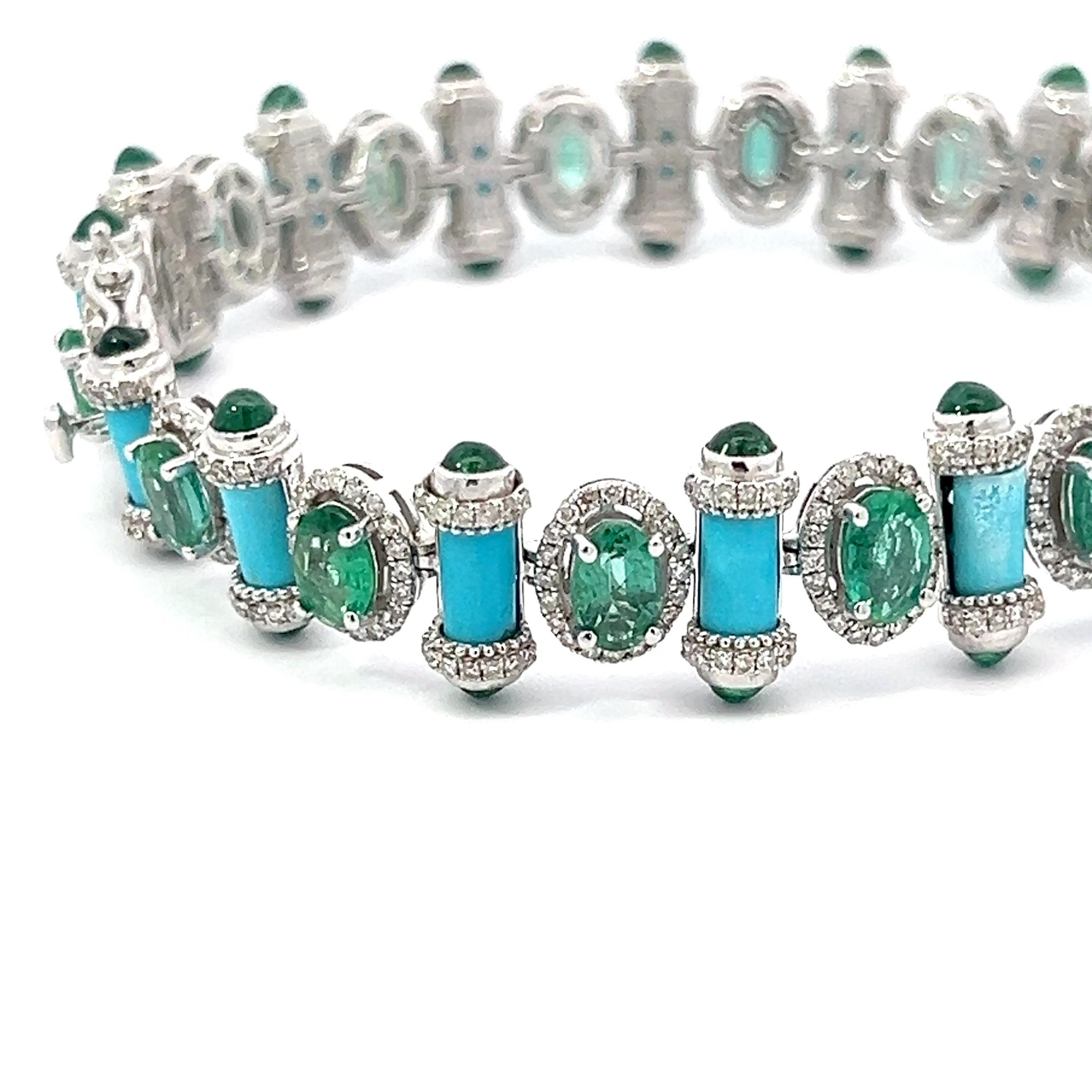 Discover the captivating beauty of our Emerald, Turquoise and Diamond Bracelet. The striking combination of vivid oval and cabochon emeralds makes this piece truly unique. Elevate any outfit with its alluring colors and exquisite design. Expertly