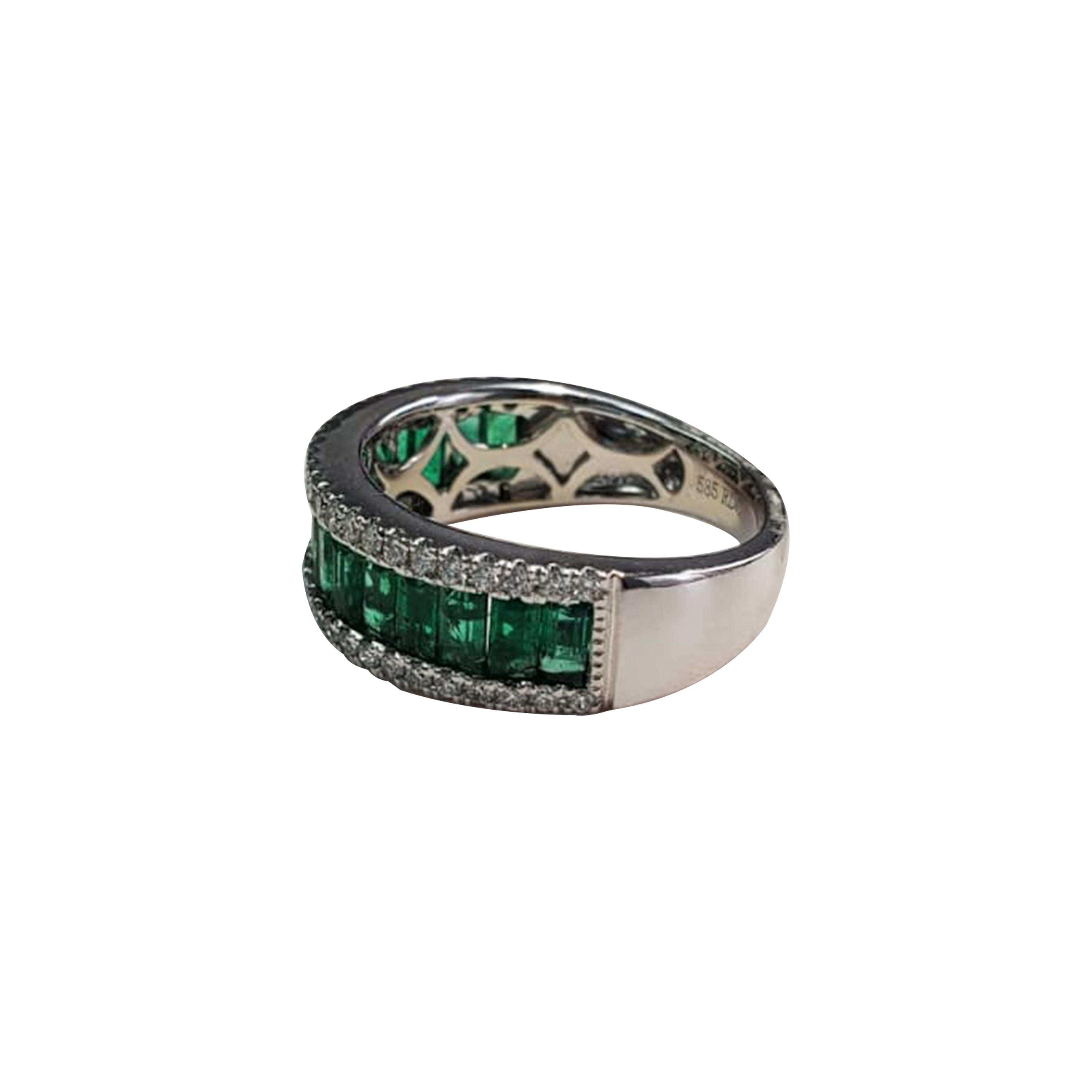Emerald Cut emerald (1.85ct)

White diamond (.36ct)
