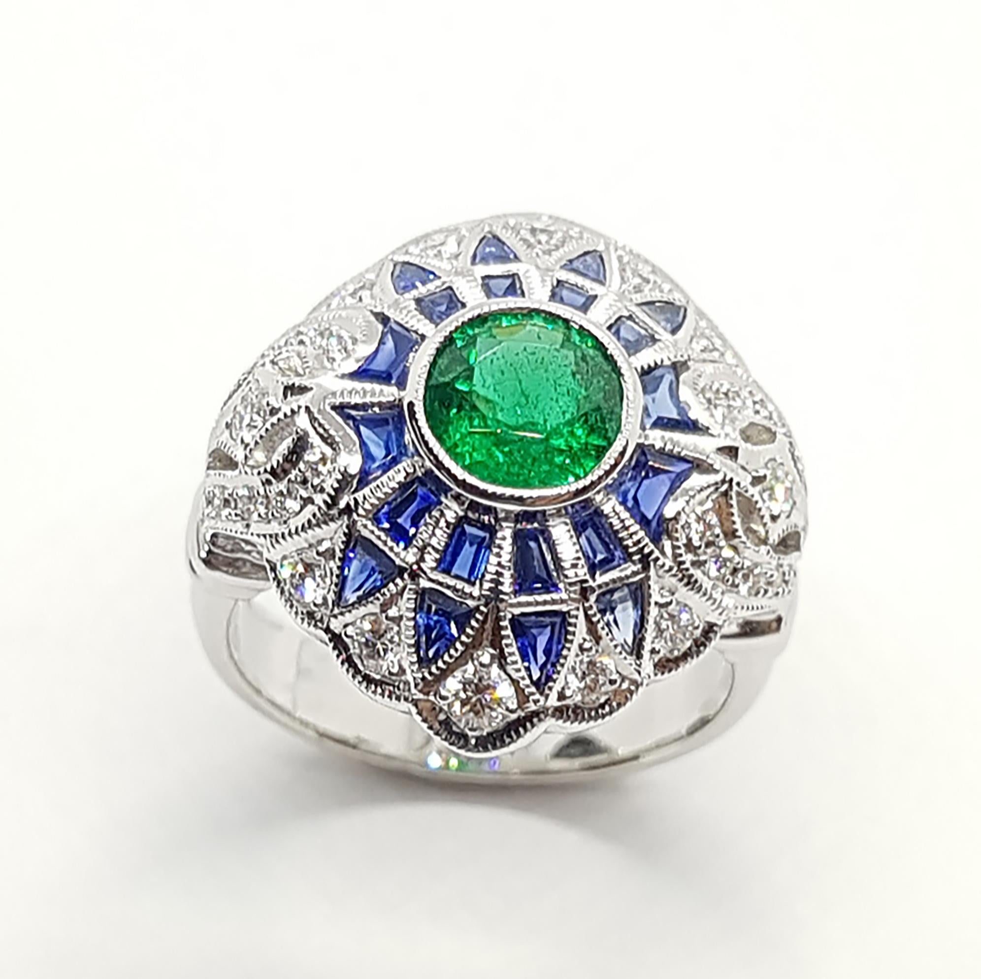 Emerald 0.87 carats with Blue sapphire 2.10 carats and Diamond 0.42 carat Ring set in 18 Karat White Gold Settings

Width:  2.0 cm 
Length: 2.0 cm
Ring Size: 53
Total Weight: 9.57 grams

