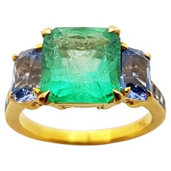 Emerald with Blue Sapphire Ring Set in 18 Karat Gold Settings