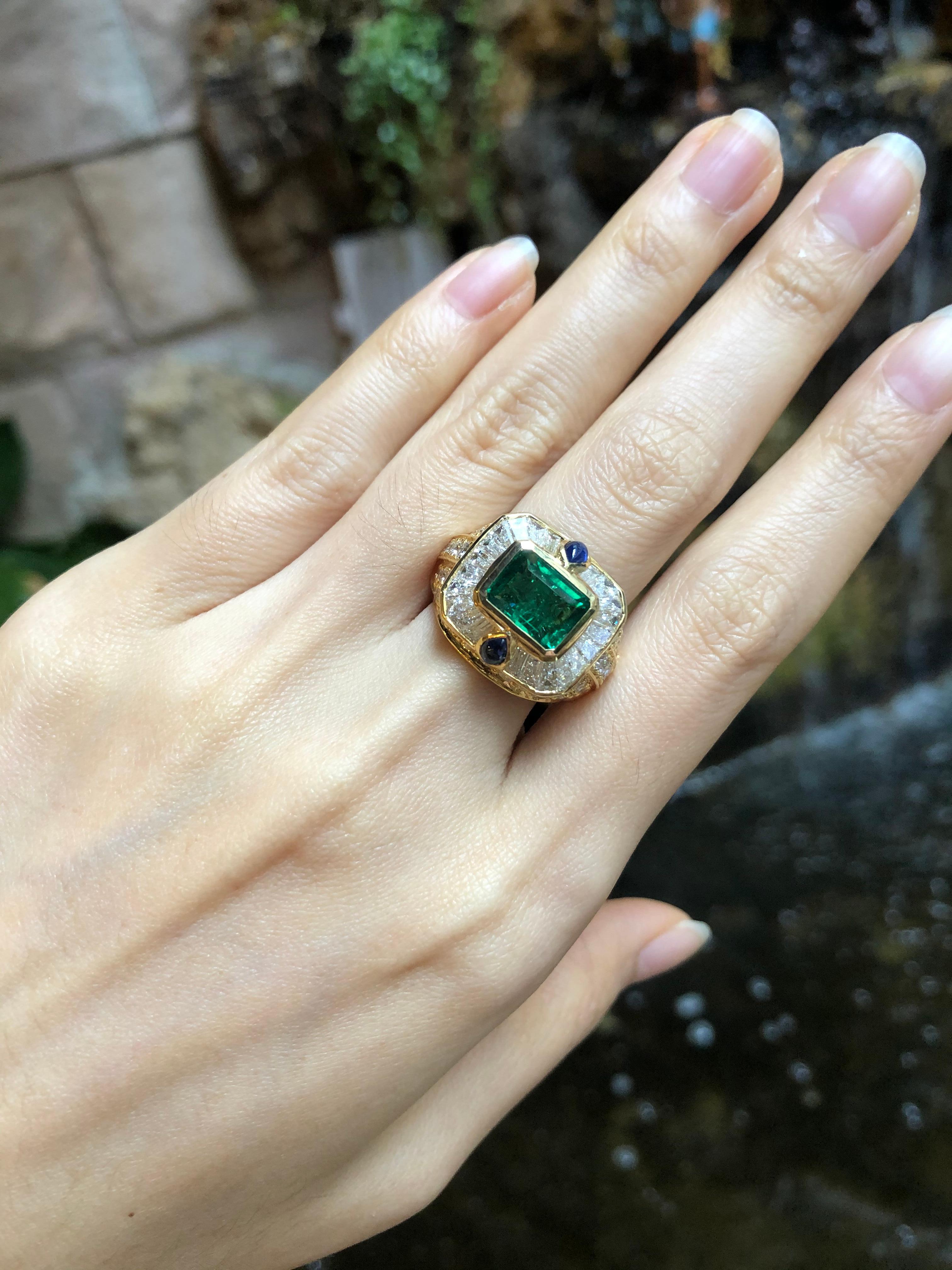 Contemporary Emerald with Diamond and Cabochon Blue Sapphire Ring in 18 Karat Gold Settings For Sale