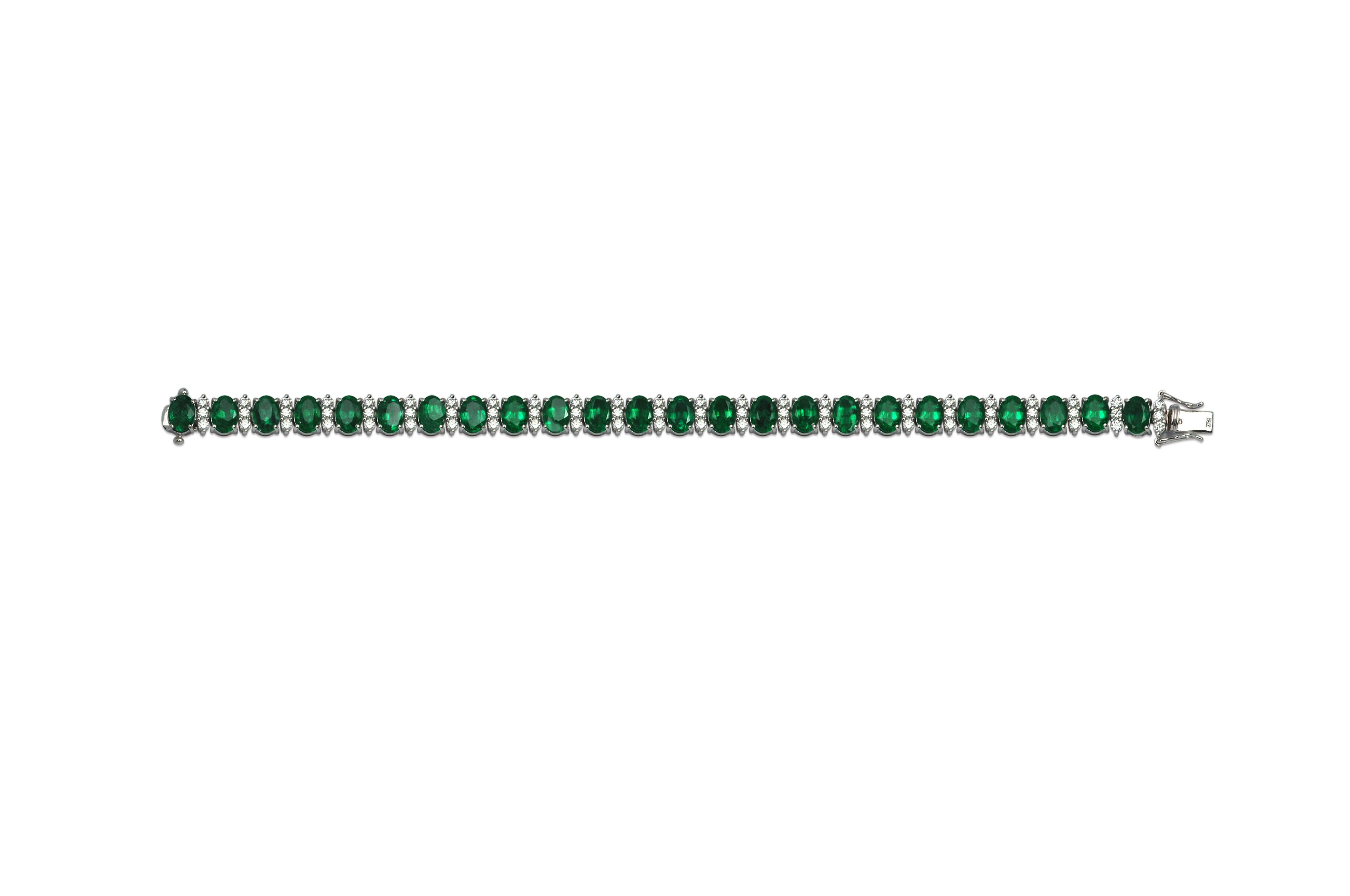 Emerald 16.35 carats with Diamond 2.17 carats Bracelet set in 18 Karat White Gold Settings 

Width: 0.6 cm
Length: 18.5 cm 


