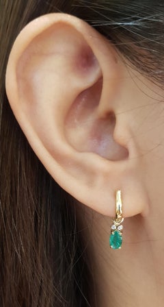 Emerald with Diamond Earrings Set in 14 Karat Gold Settings
