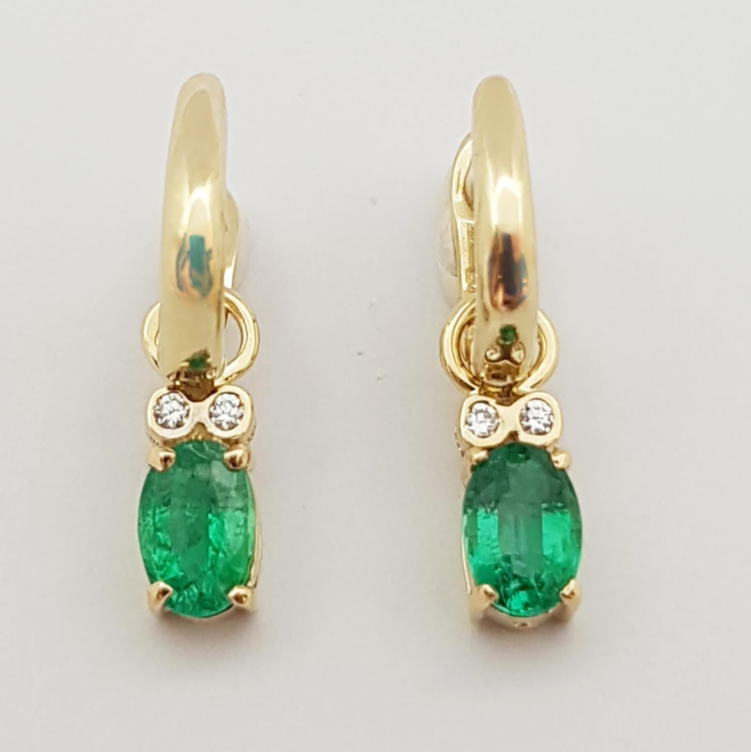 Oval Cut Emerald with Diamond Earrings Set in 14 Karat Gold Settings For Sale