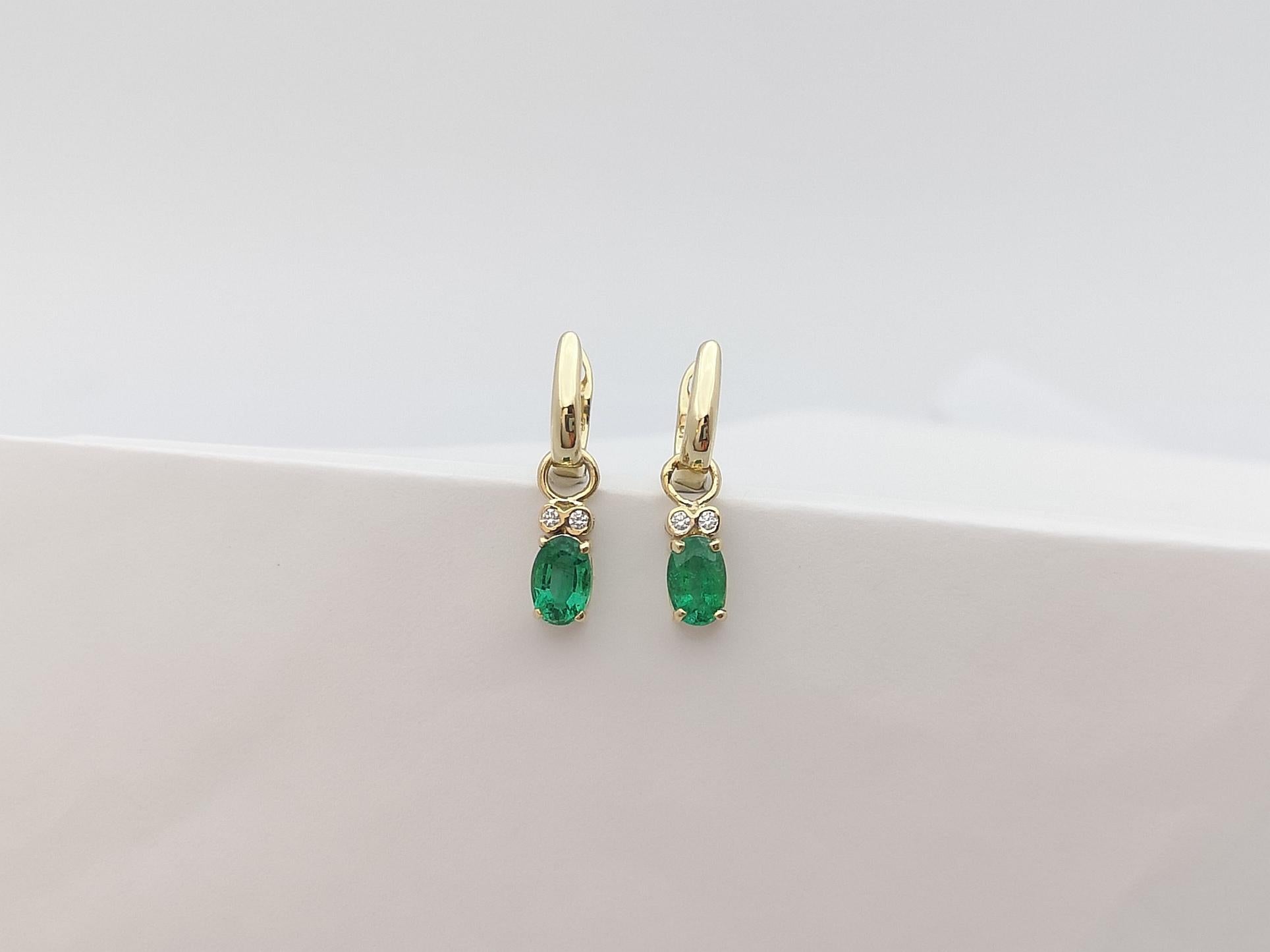 Women's Emerald with Diamond Earrings Set in 14 Karat Gold Settings For Sale