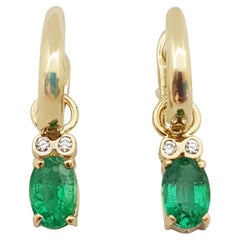 Emerald with Diamond Earrings Set in 14 Karat Gold Settings