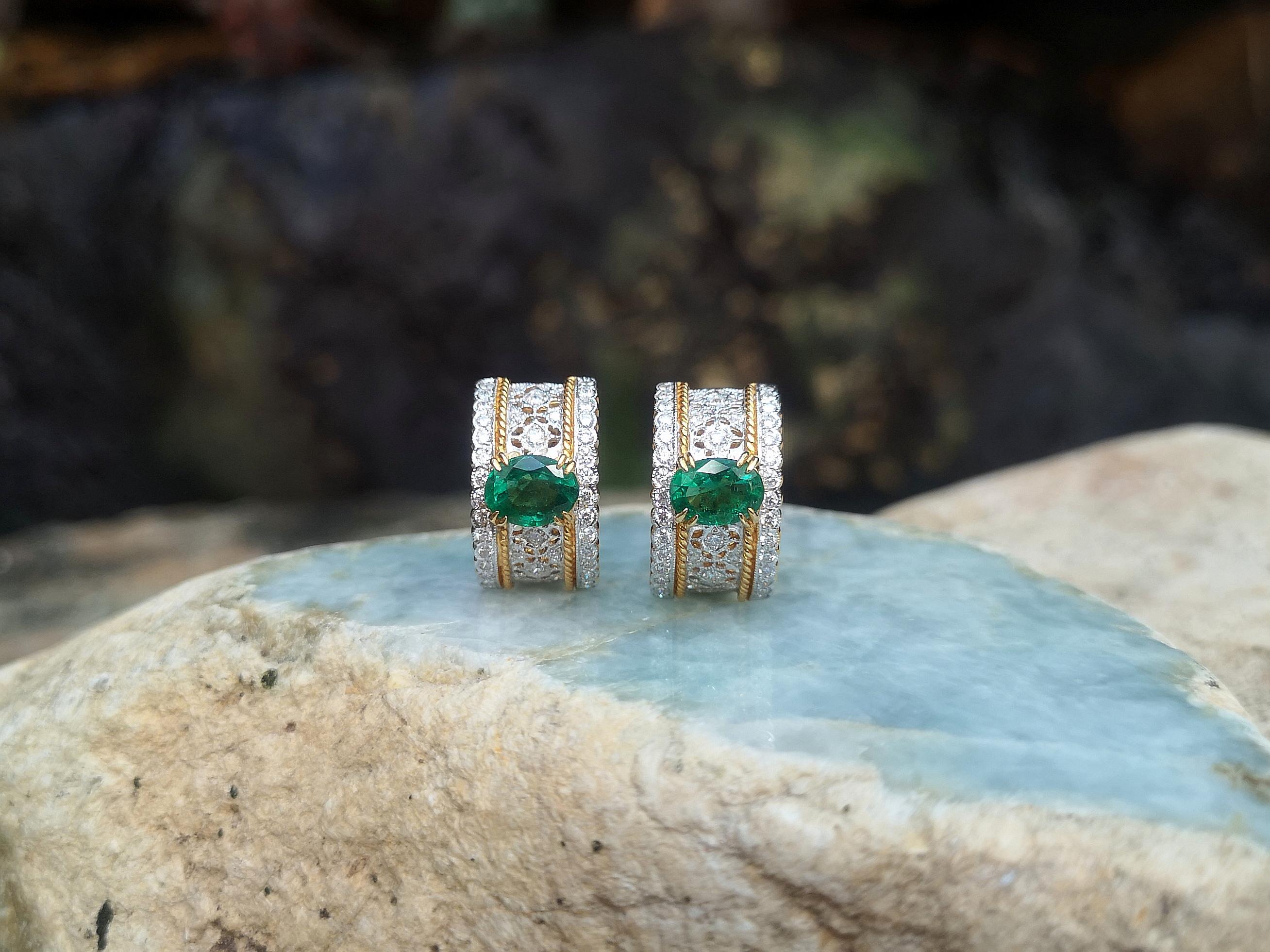 Oval Cut Emerald with Diamond Earrings Set in 18 Karat Gold Settings For Sale