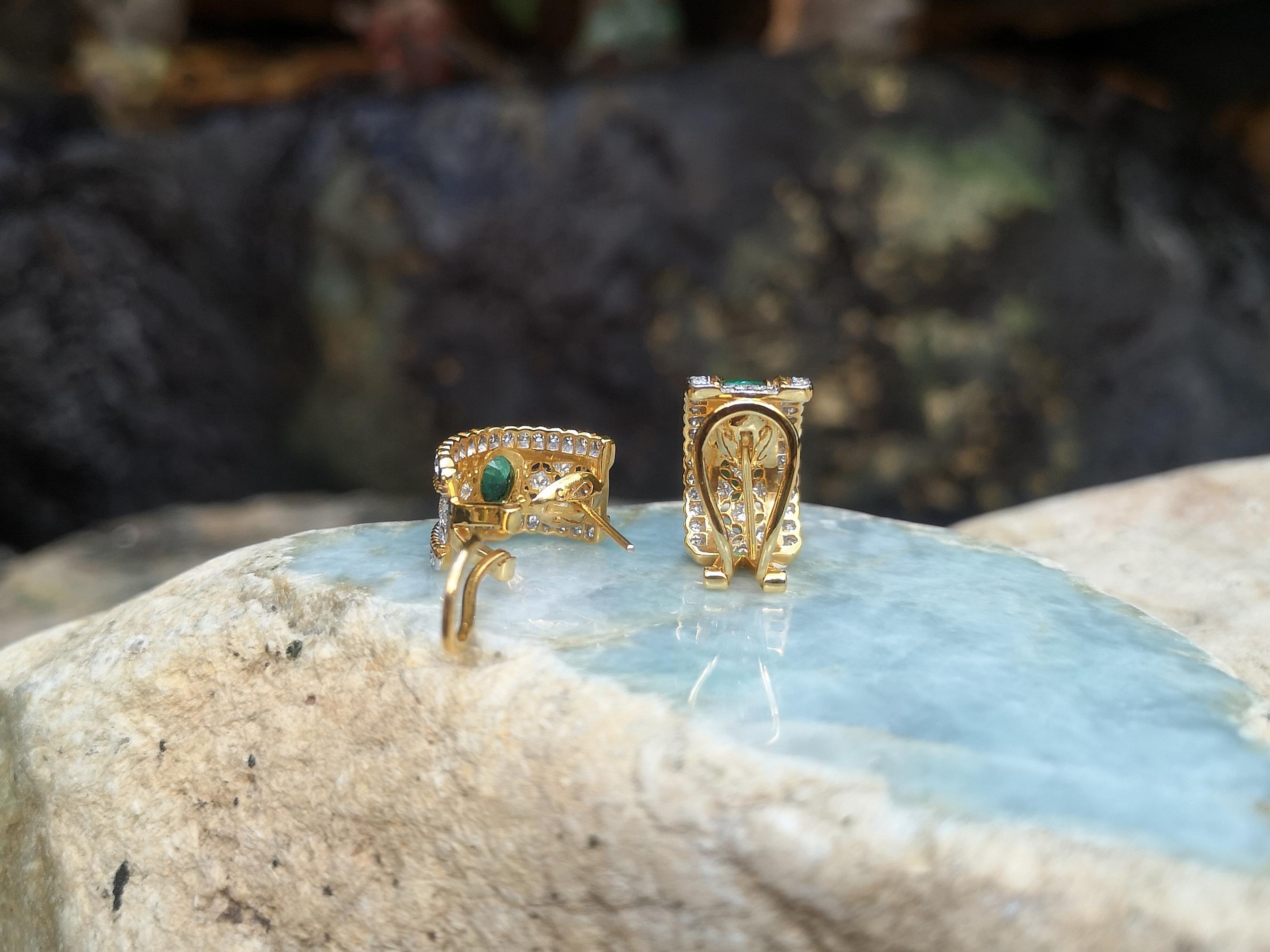 Women's Emerald with Diamond Earrings Set in 18 Karat Gold Settings For Sale