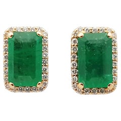Emerald with Diamond Earrings Set in 18 Karat Rose Gold Settings