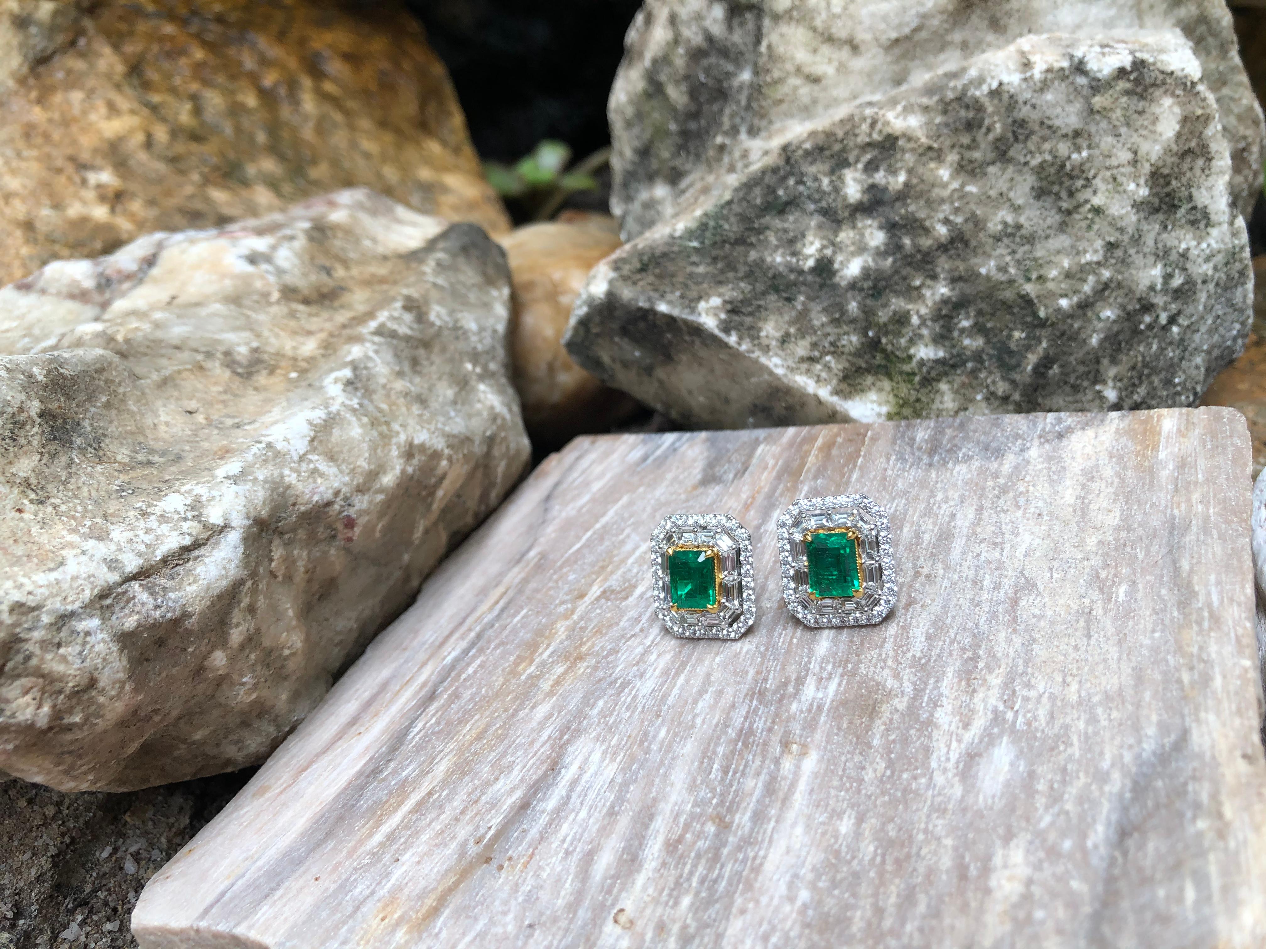 Women's Emerald with Diamond Earrings Set in 18 Karat White Gold Settings For Sale
