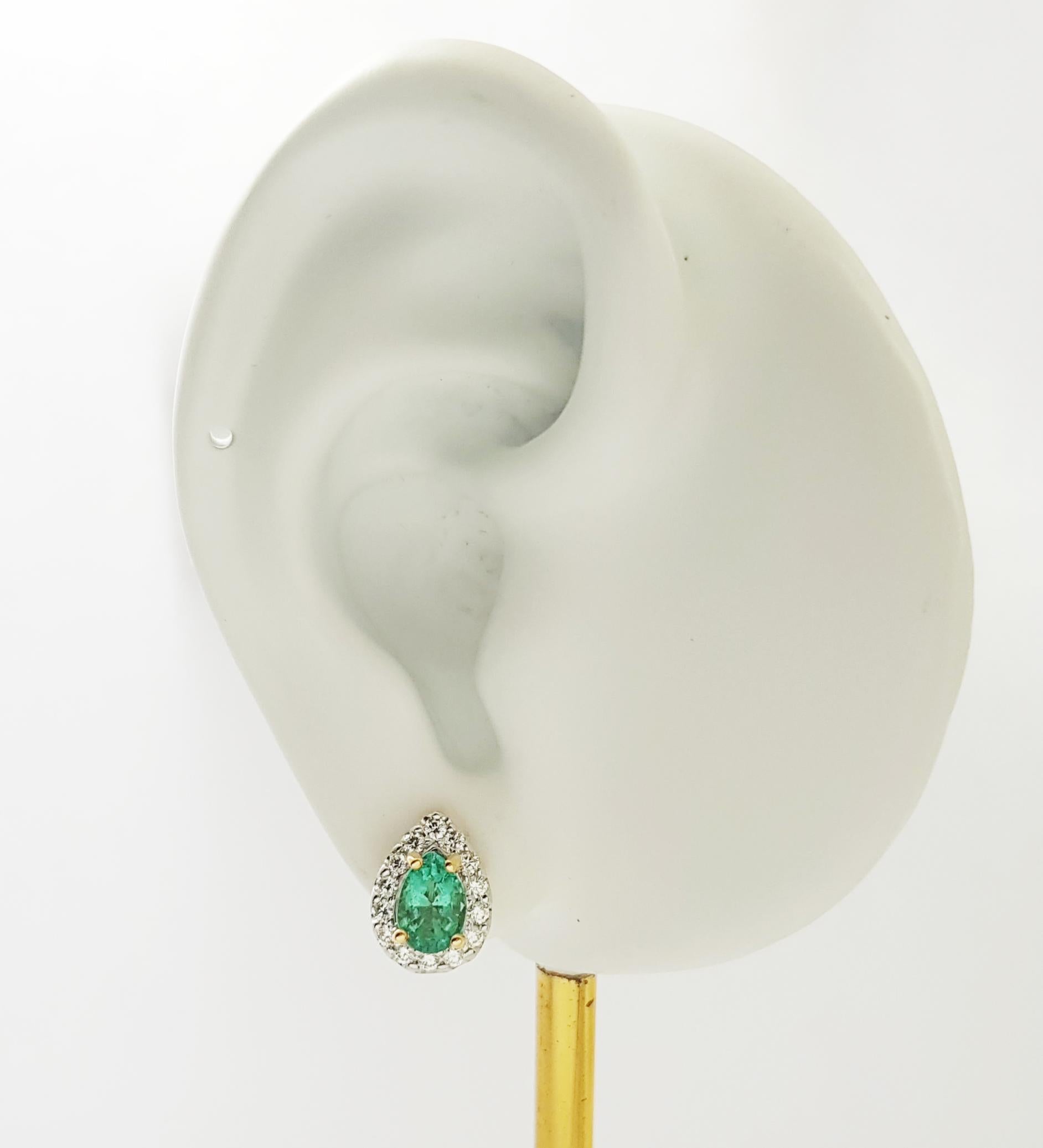 Emerald 1.22 carats with Diamond 0.42 carat Earrings set in 18K Gold Settings

Width: 0.9 cm 
Length: 1.1 cm
Total Weight: 3.95 grams

