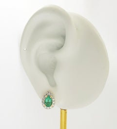Emerald with Diamond Earrings set in 18K Gold Settings