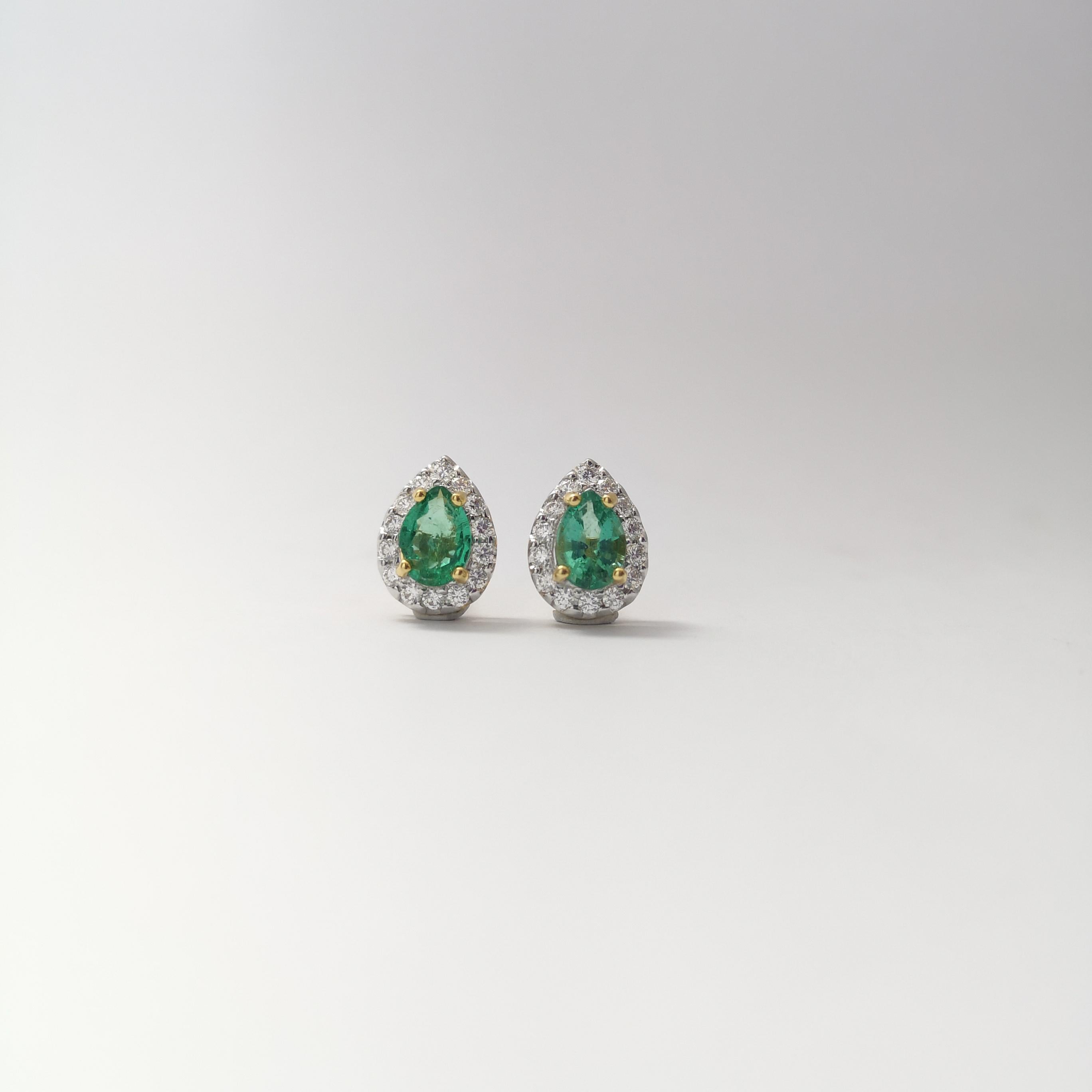 Pear Cut Emerald with Diamond Earrings set in 18K Gold Settings For Sale