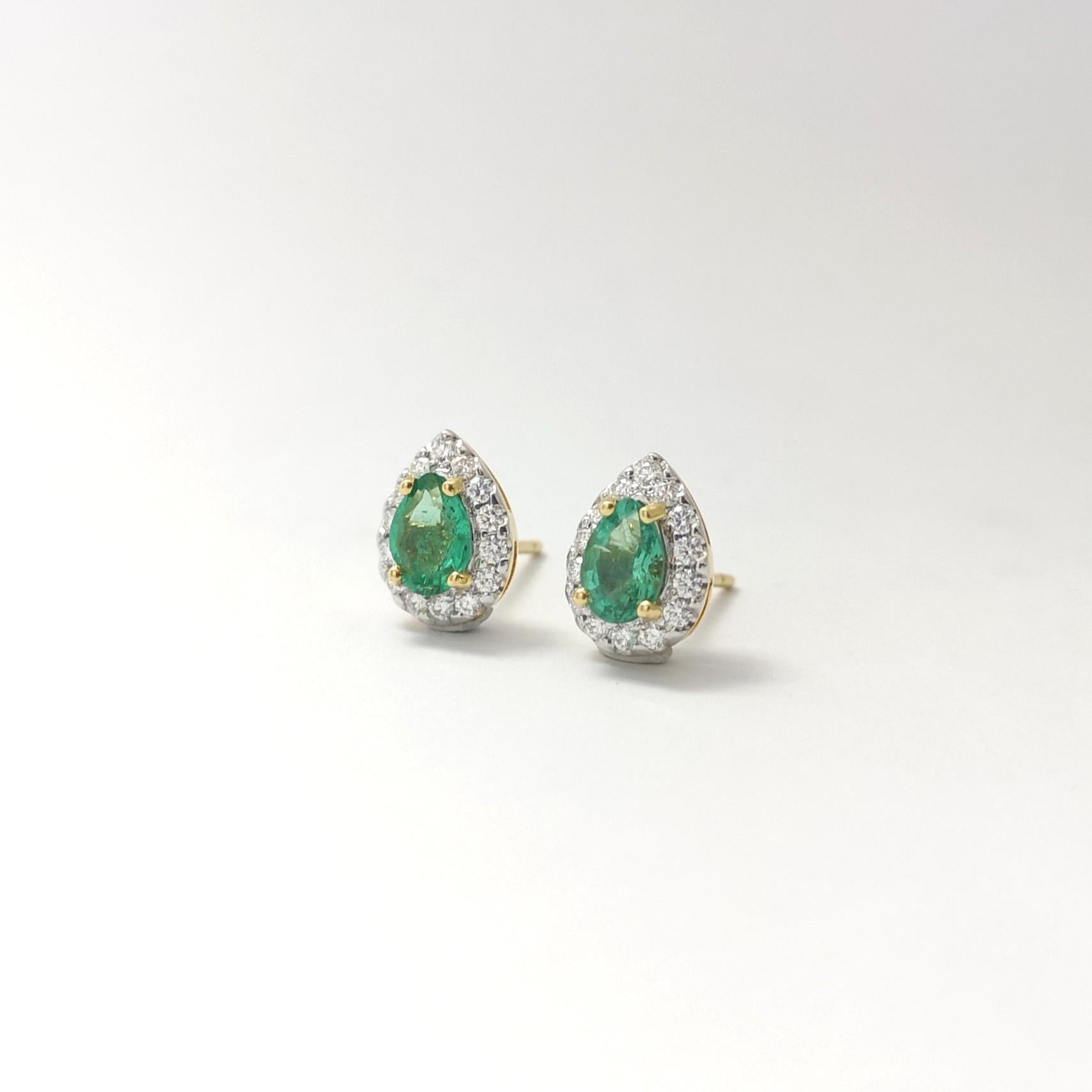 Women's Emerald with Diamond Earrings set in 18K Gold Settings For Sale