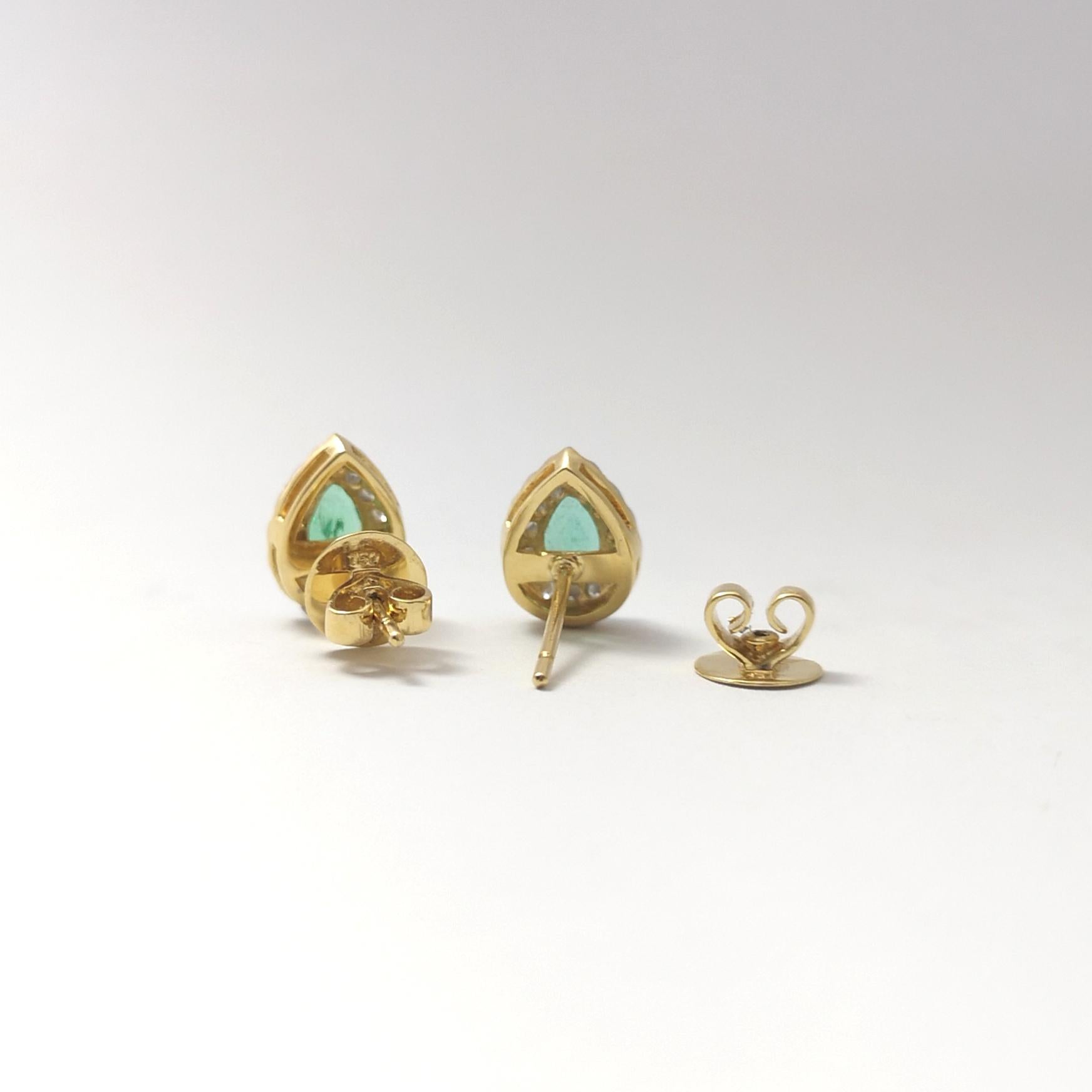 Emerald with Diamond Earrings set in 18K Gold Settings For Sale 3
