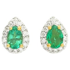 Emerald with Diamond Earrings set in 18K Gold Settings