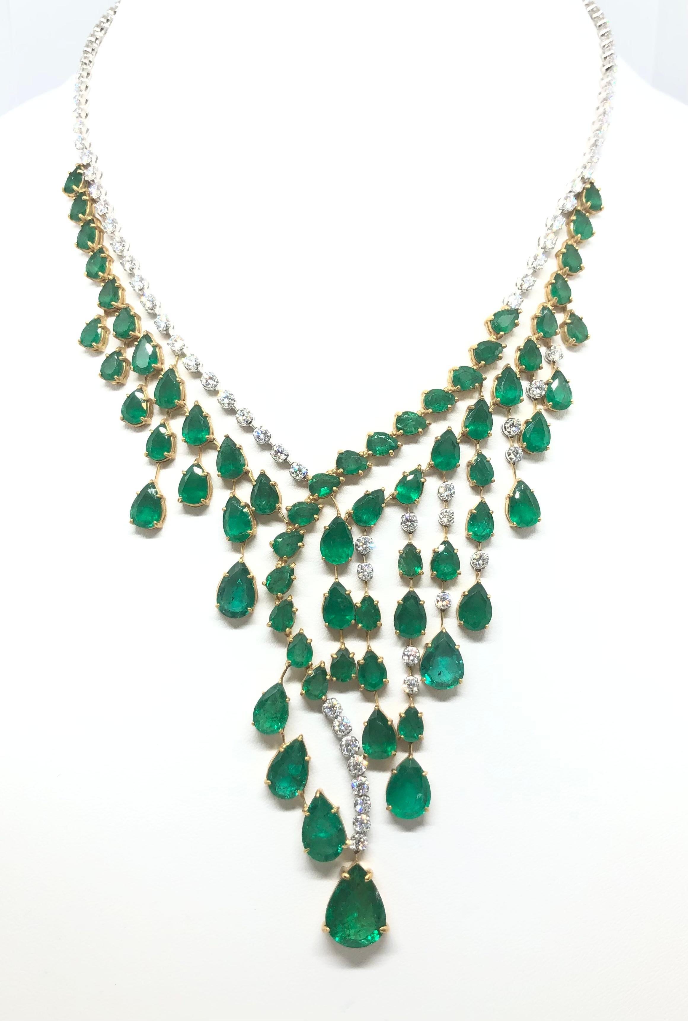 Emerald 67.91 carats with Diamond 10.71 carats Necklace set in 18 Karat White Gold Settings

Width:  17.0 cm 
Length:  40.0 cm
Total Weight: 70.12 grams

Extender: 5.3 cm

